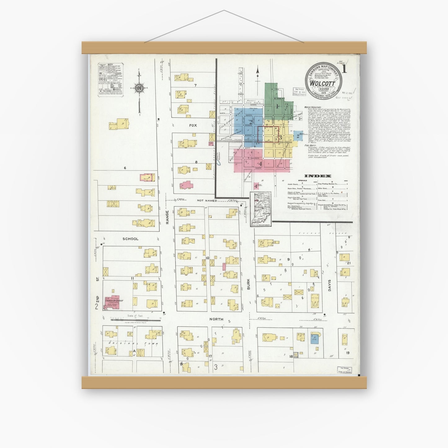 Old map wall art mockup — magnetic wood frame on white wall — Sanborn Fire Insurance Map from Wolcott, White County, Indiana (1919) - Complete Map Set