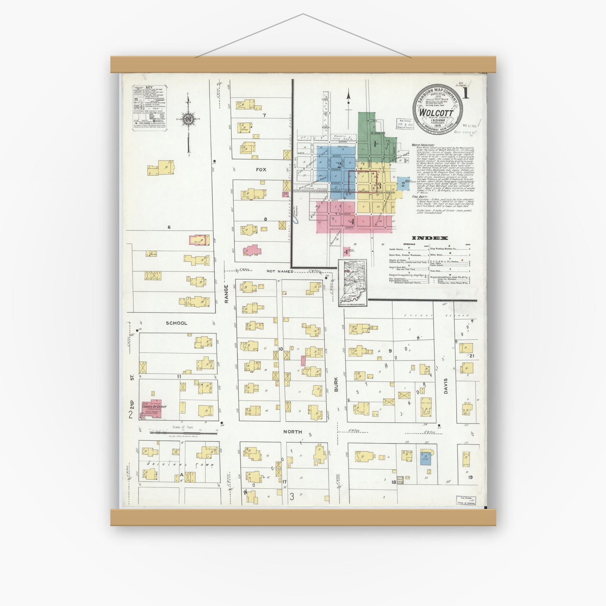 Old map wall art mockup — magnetic wood frame on white wall — Sanborn Fire Insurance Map from Wolcott, White County, Indiana (1919) - Complete Map Set