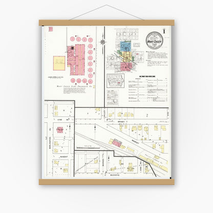 Old map wall art mockup — magnetic wood frame on white wall — Sanborn Fire Insurance Map from What Cheer, Keokuk County, Iowa (1916), Sheet #0001