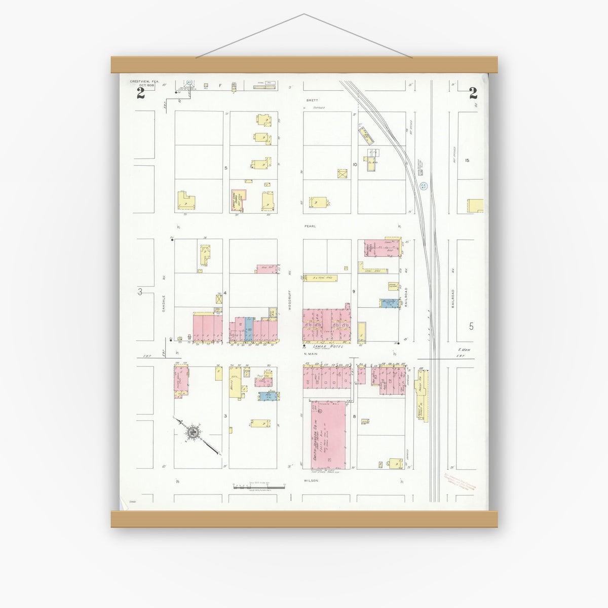 Old map wall art mockup — magnetic wood frame on white wall — Sanborn Fire Insurance Map from Crestview, Okaloosa County, Florida (1939), Sheet #0002