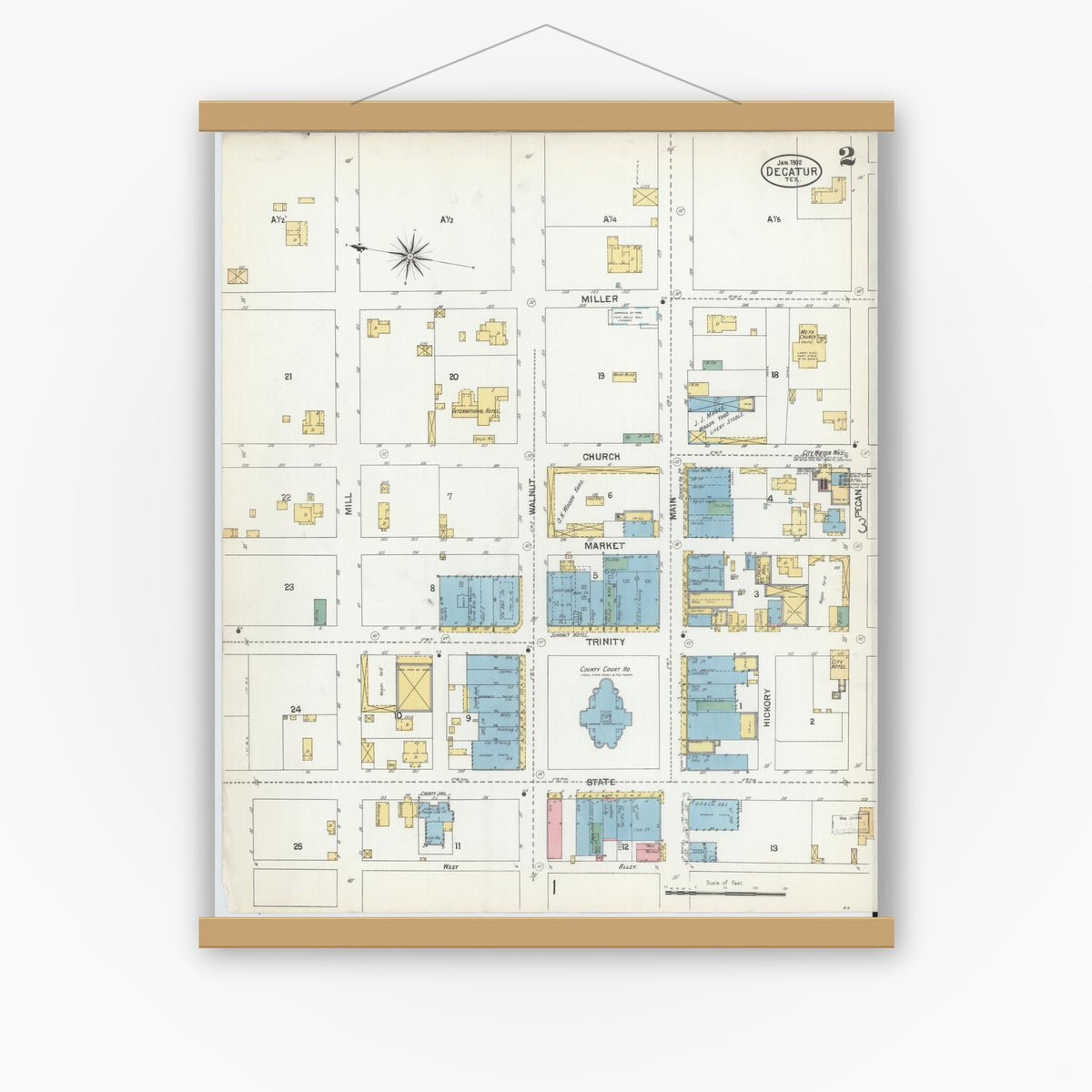 Old map wall art mockup — magnetic wood frame on white wall — Sanborn Fire Insurance Map from Decatur, Wise County, Texas (1902), Sheet #0002
