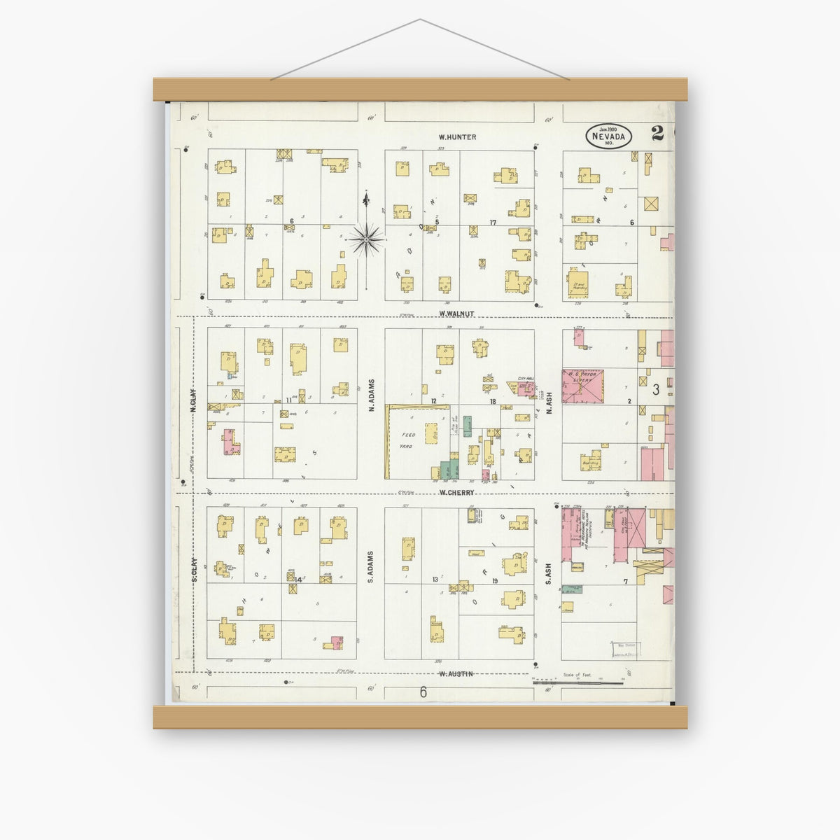 Old map wall art mockup — magnetic wood frame on white wall — Sanborn Fire Insurance Map from Nevada, Vernon County, Missouri (1900), Sheet #0002
