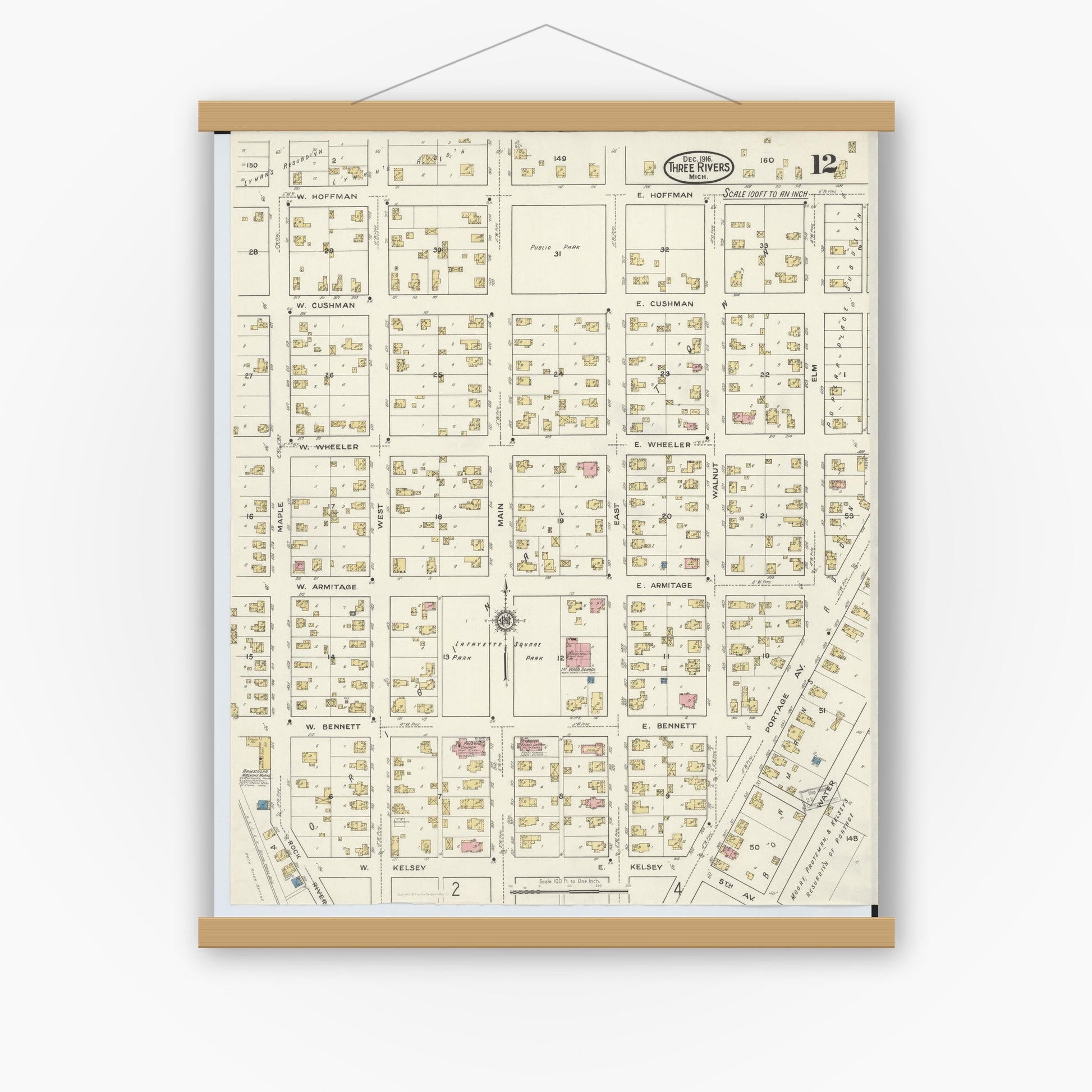 Old map wall art mockup — magnetic wood frame on white wall — Sanborn Fire Insurance Map from Three Rivers, Saint Joseph County, Michigan (1916), Sheet #0012