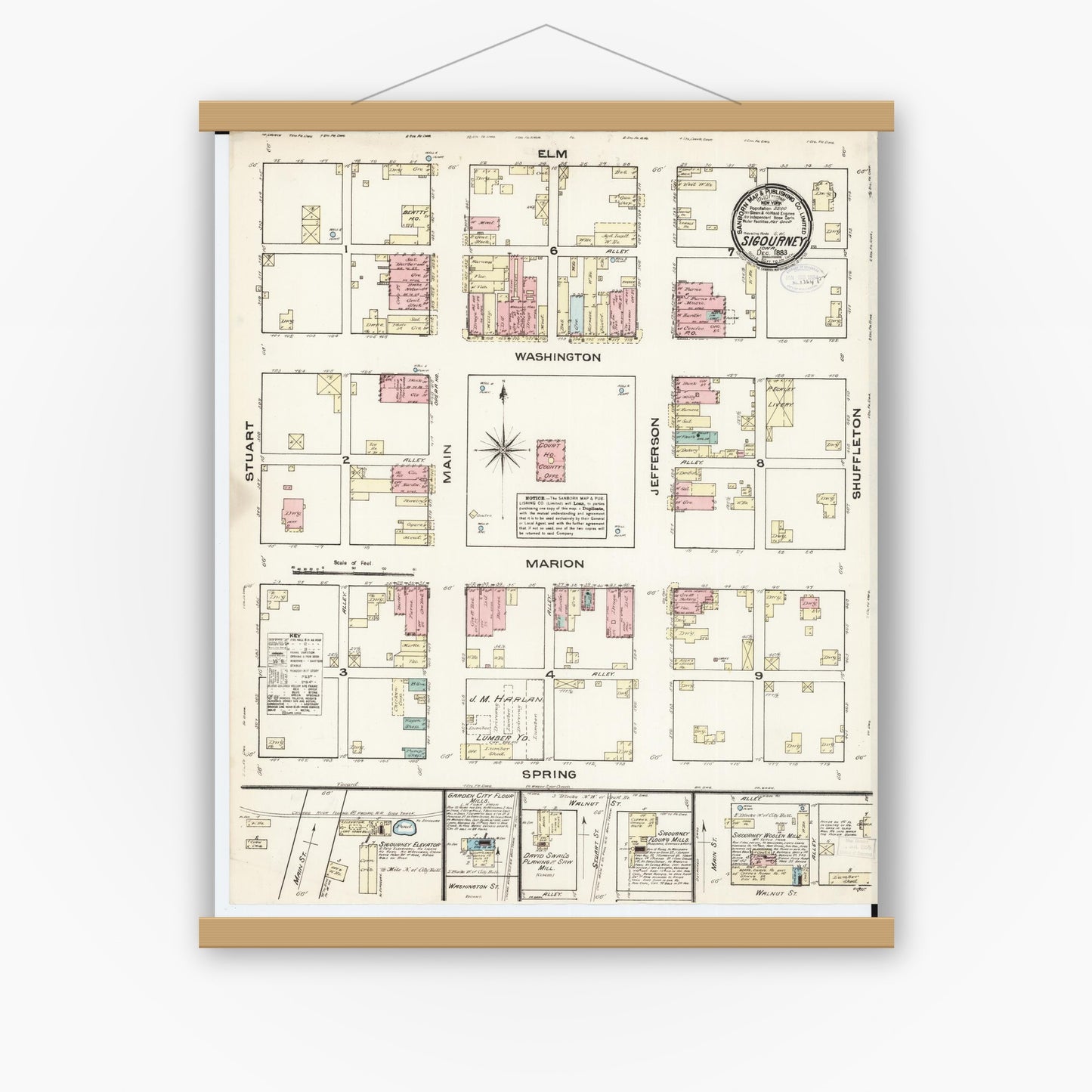 Old map wall art mockup — magnetic wood frame on white wall — Sanborn Fire Insurance Map from Sigourney, Kiokuk County, Iowa (1883), Sheet #0001