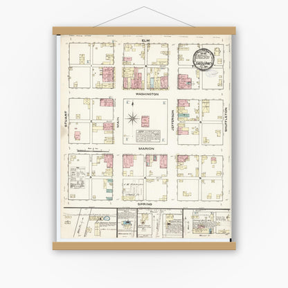 Old map wall art mockup — magnetic wood frame on white wall — Sanborn Fire Insurance Map from Sigourney, Kiokuk County, Iowa (1883), Sheet #0001