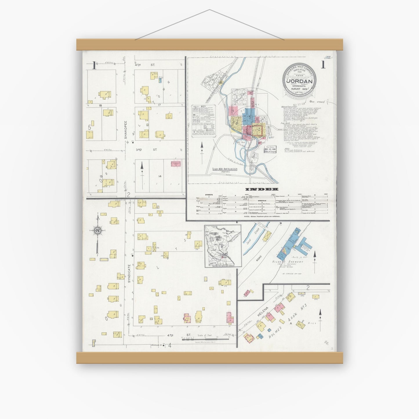Old map wall art mockup — magnetic wood frame on white wall — Sanborn Fire Insurance Map from Jordan, Scott County, Minnesota (1928), Sheet #0001