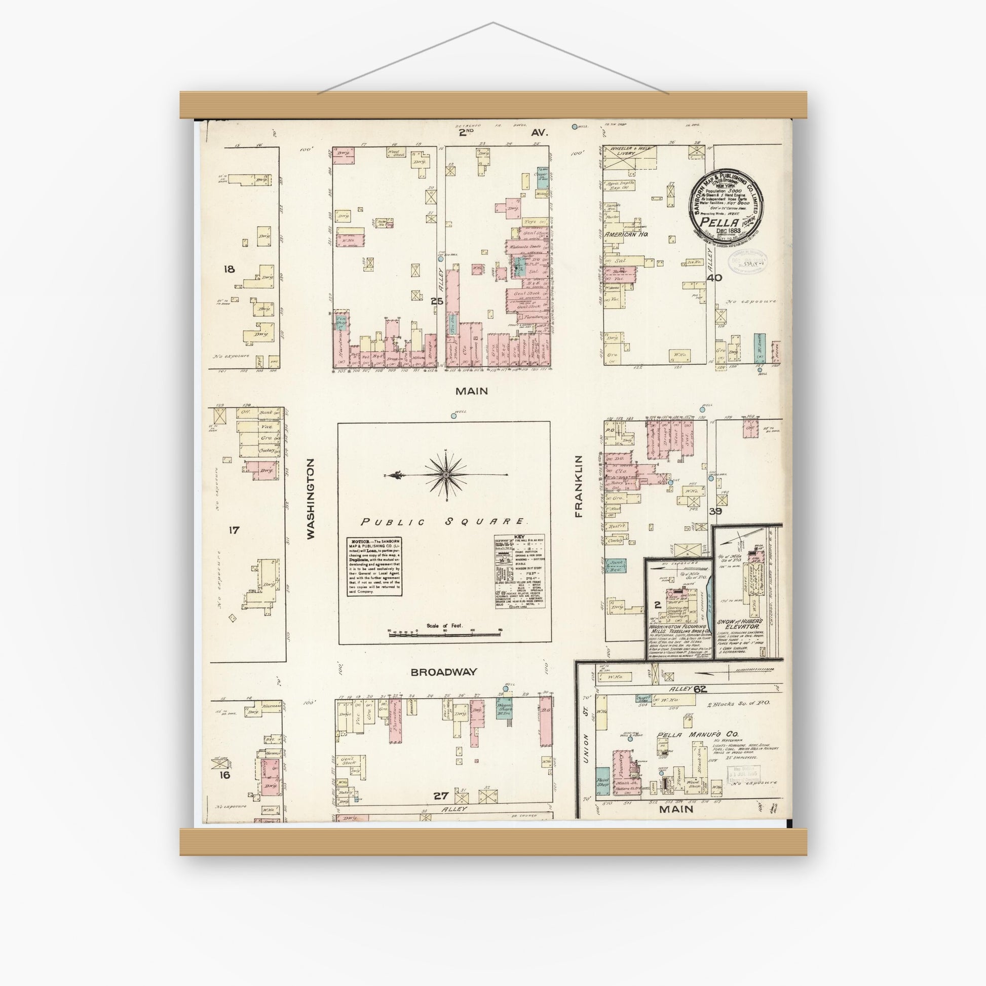 Old map wall art mockup — magnetic wood frame on white wall — Sanborn Fire Insurance Map from Pella, Marion County, Iowa (1883), Sheet #0001