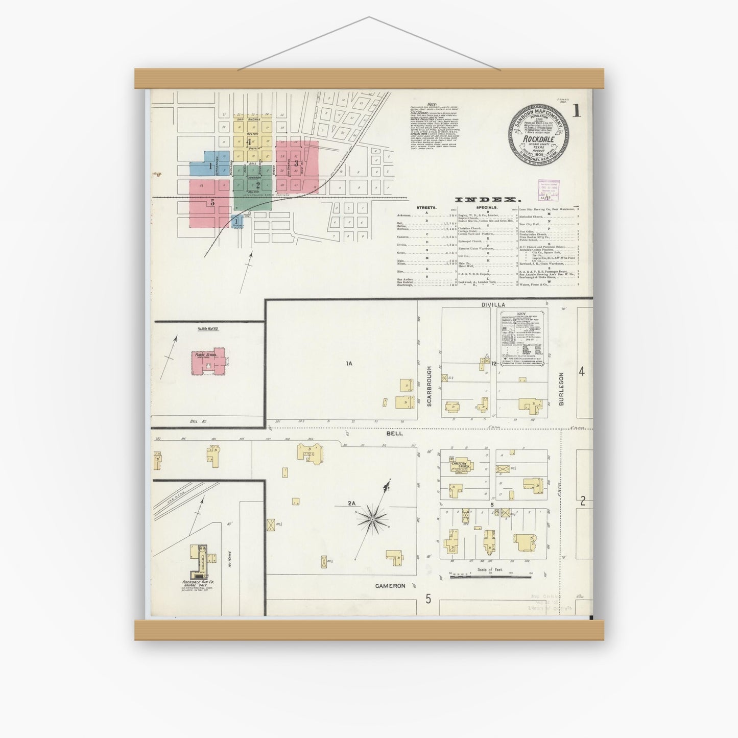 Old map wall art mockup — magnetic wood frame on white wall — Sanborn Fire Insurance Map from Rockdale, Milam County, Texas (1906) - Complete Map Set