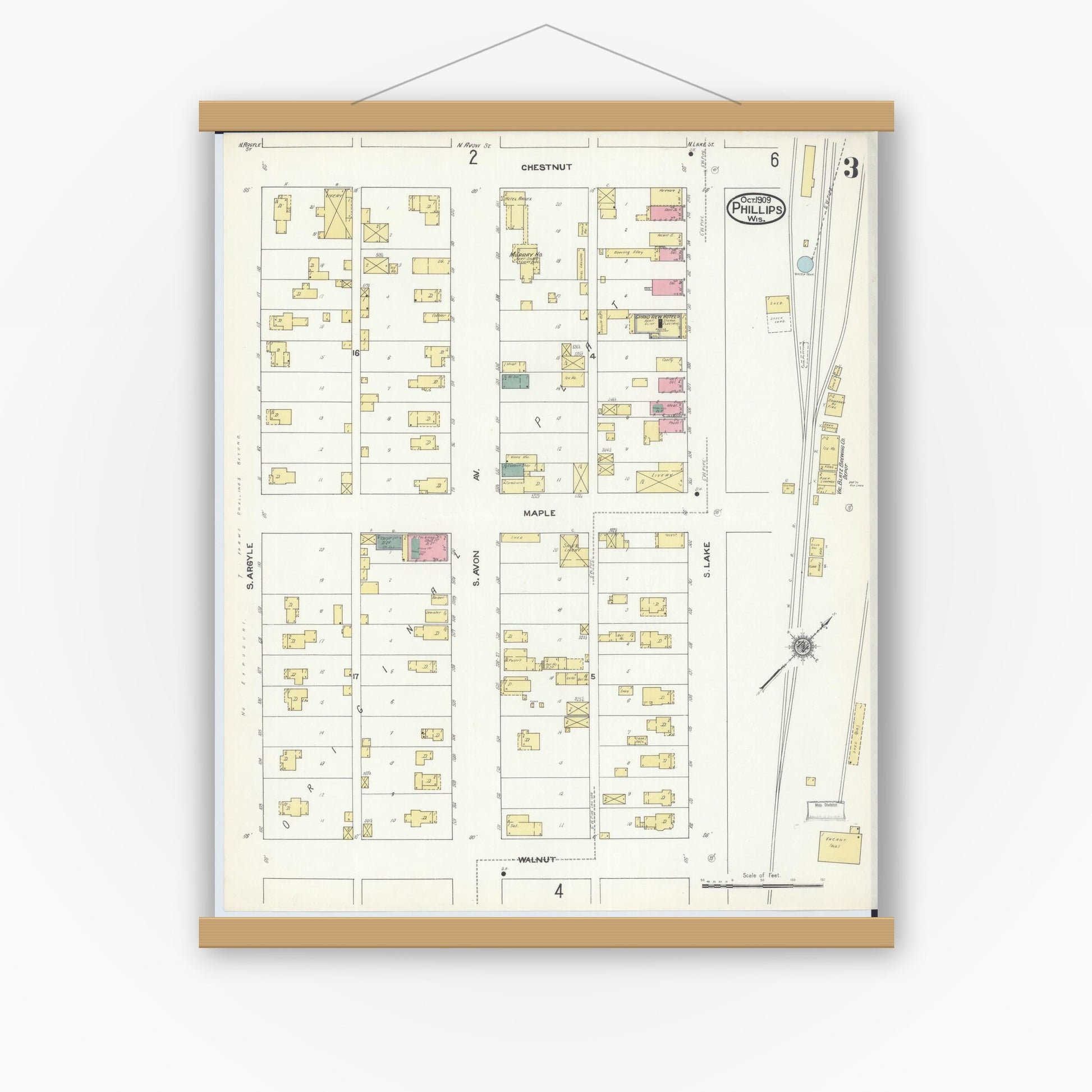 Old map wall art mockup — magnetic wood frame on white wall — Sanborn Fire Insurance Map from Phillips, Price County, Wisconsin (1909), Sheet #0003