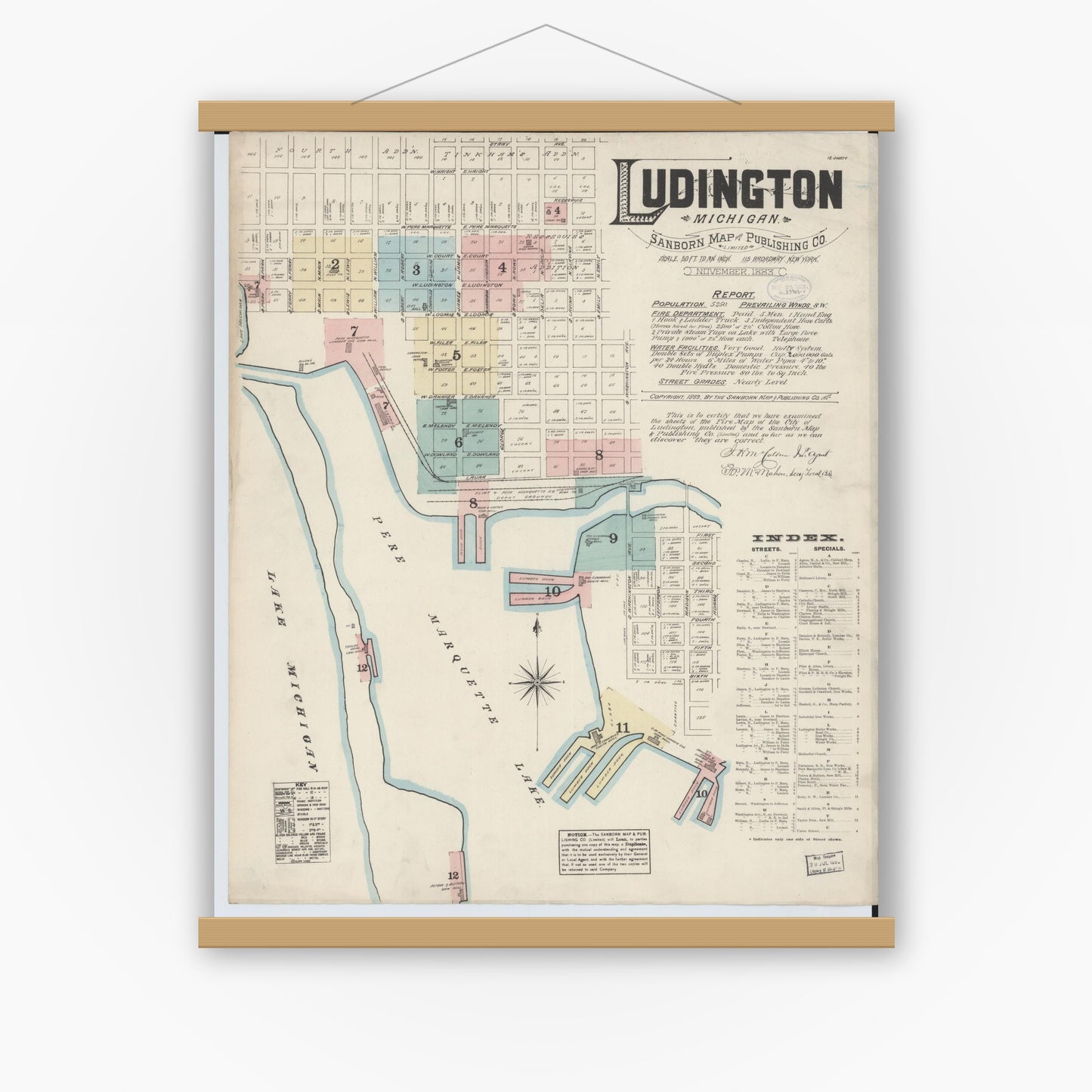 Old map wall art mockup — magnetic wood frame on white wall — Sanborn Fire Insurance Map from Ludington, Mason County, Michigan (1883) - Complete Map Set