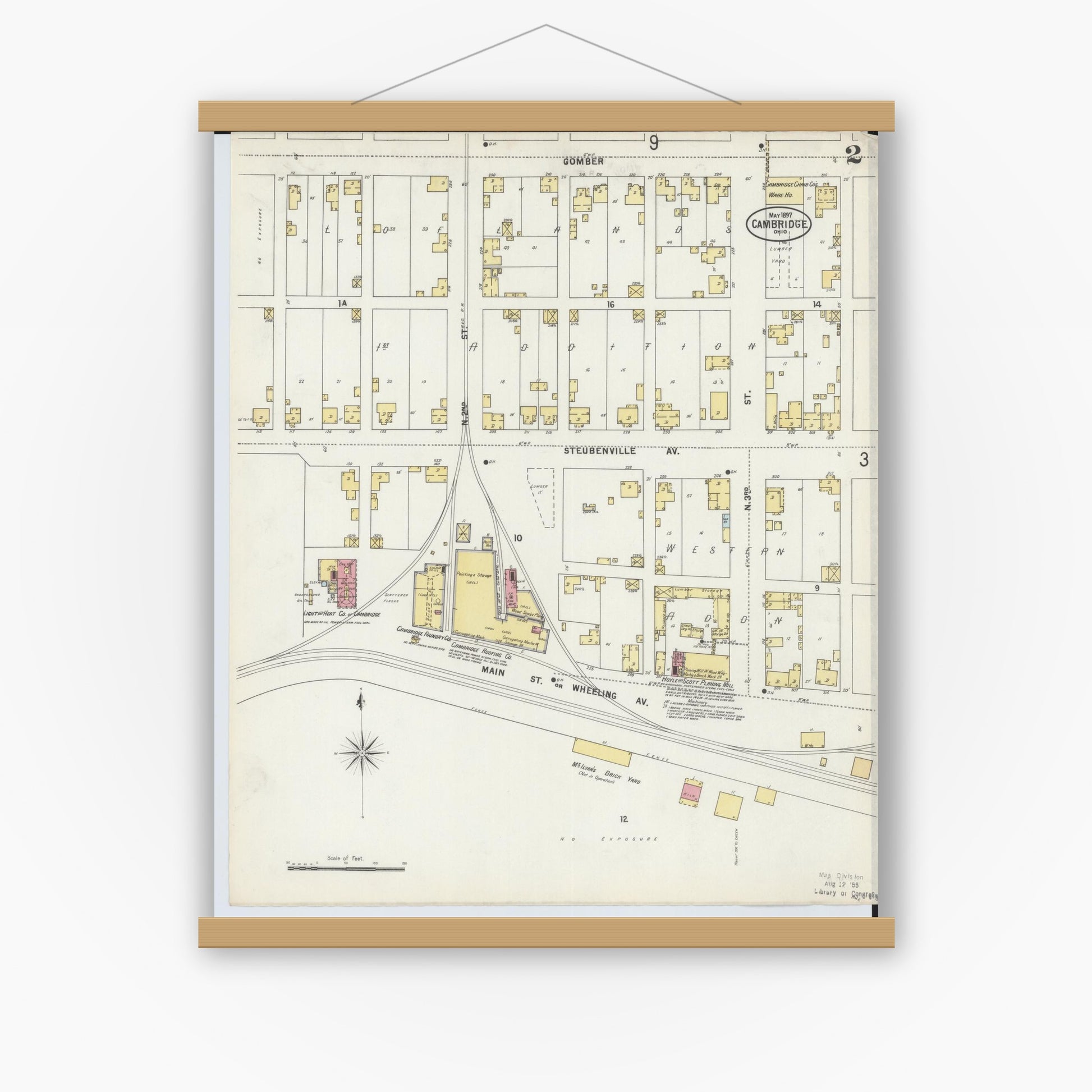 Old map wall art mockup — magnetic wood frame on white wall — Sanborn Fire Insurance Map from Cambridge, Guernsey County, Ohio (1897), Sheet #0002