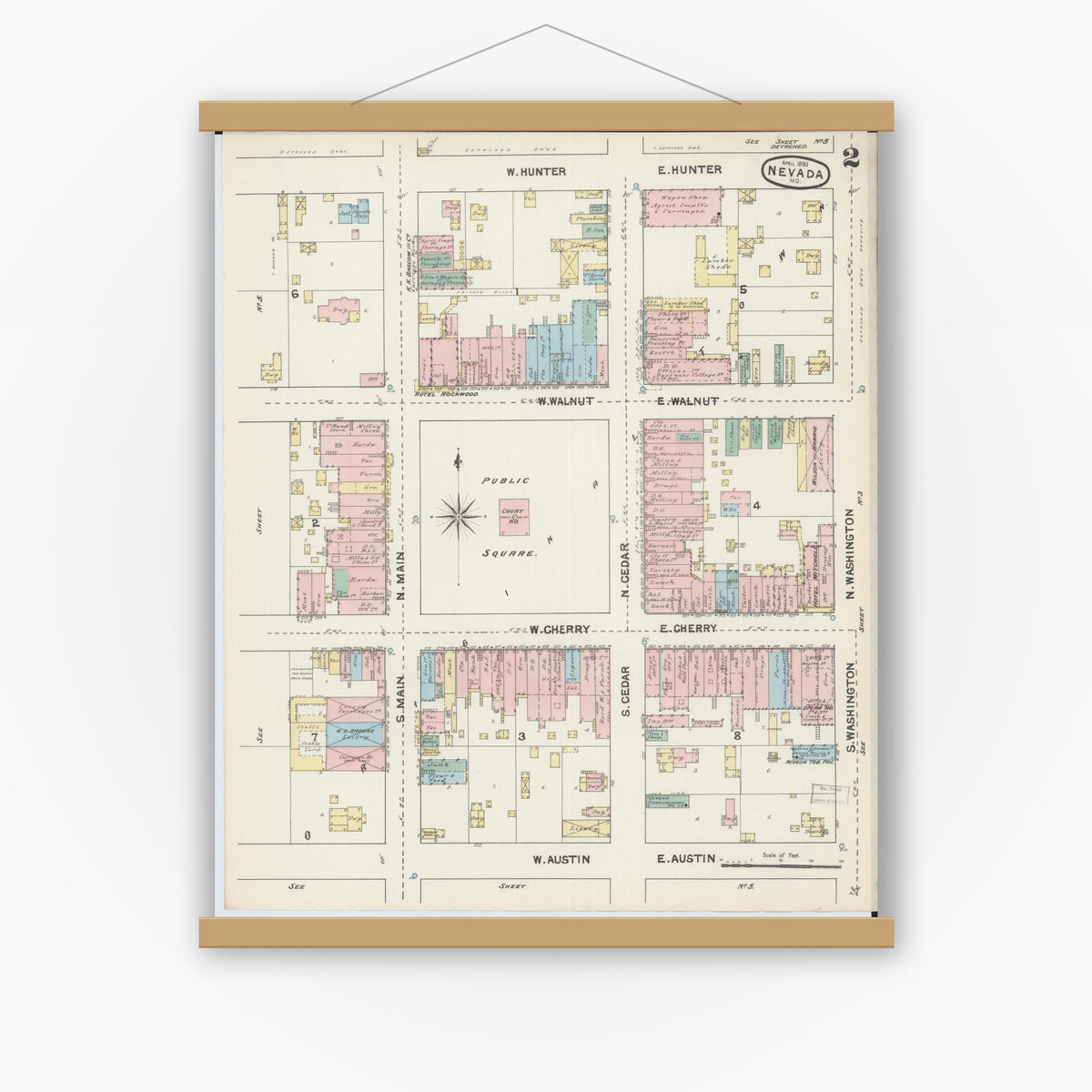 Old map wall art mockup — magnetic wood frame on white wall — Sanborn Fire Insurance Map from Nevada, Vernon County, Missouri (1890), Sheet #0002
