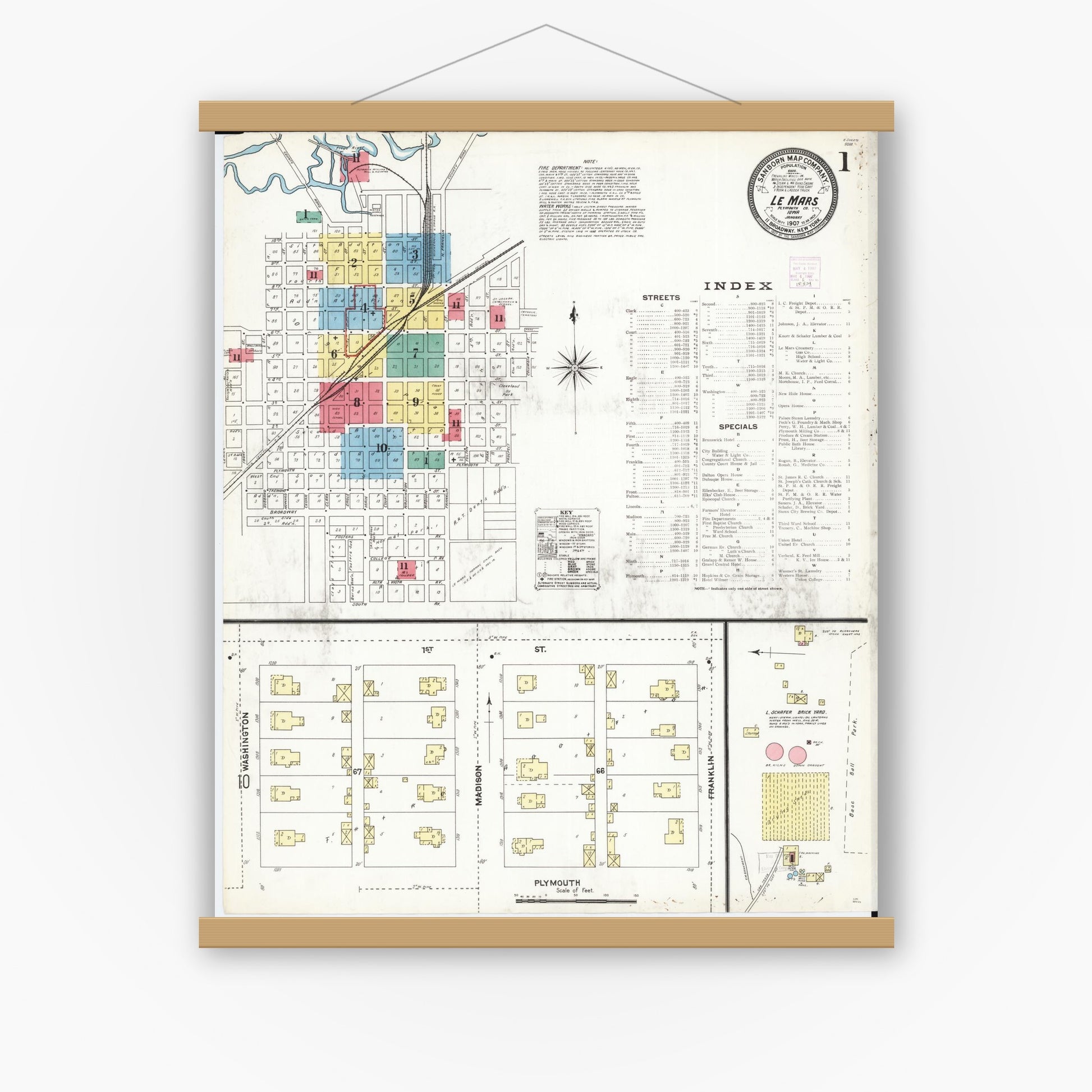 Old map wall art mockup — magnetic wood frame on white wall — Sanborn Fire Insurance Map from Le Mars, Plymouth County, Iowa (1907) â€” Complete Set
