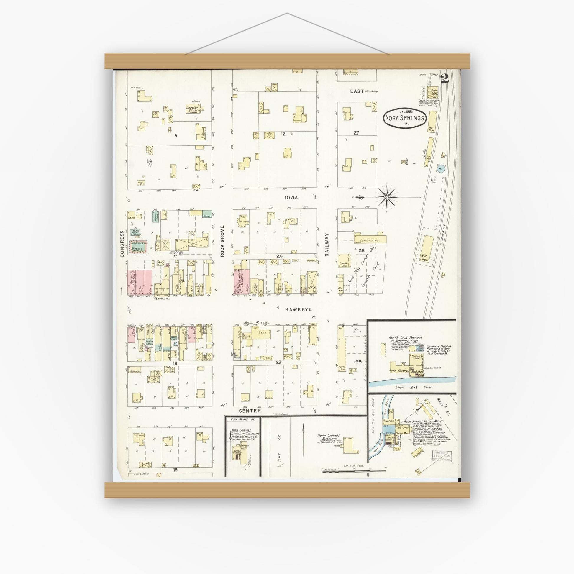 Old map wall art mockup — magnetic wood frame on white wall — Sanborn Fire Insurance Map from Nora Springs, Floyd County, Iowa (1896), Sheet #0002