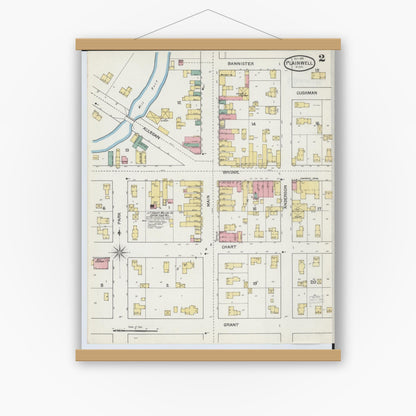 Old map wall art mockup — magnetic wood frame on white wall — Sanborn Fire Insurance Map from Plainwell, Allegan County, Michigan (1892), Sheet #0002