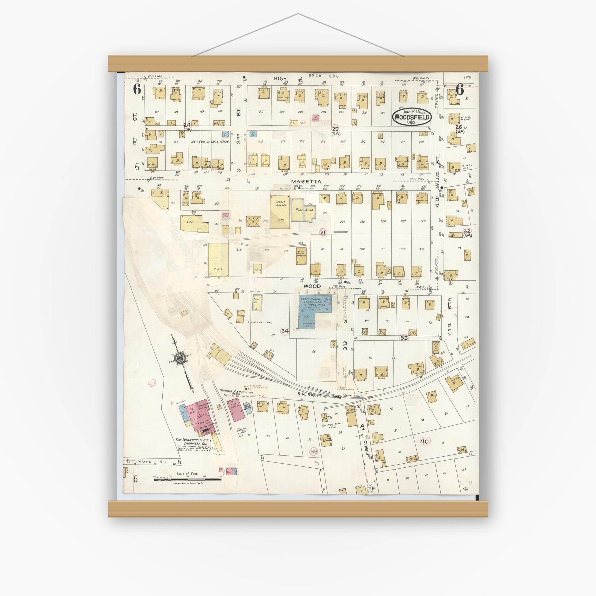 Old map wall art mockup — magnetic wood frame on white wall — Sanborn Fire Insurance Map from Woodsfield, Monroe County, Ohio (1949), Sheet #0006