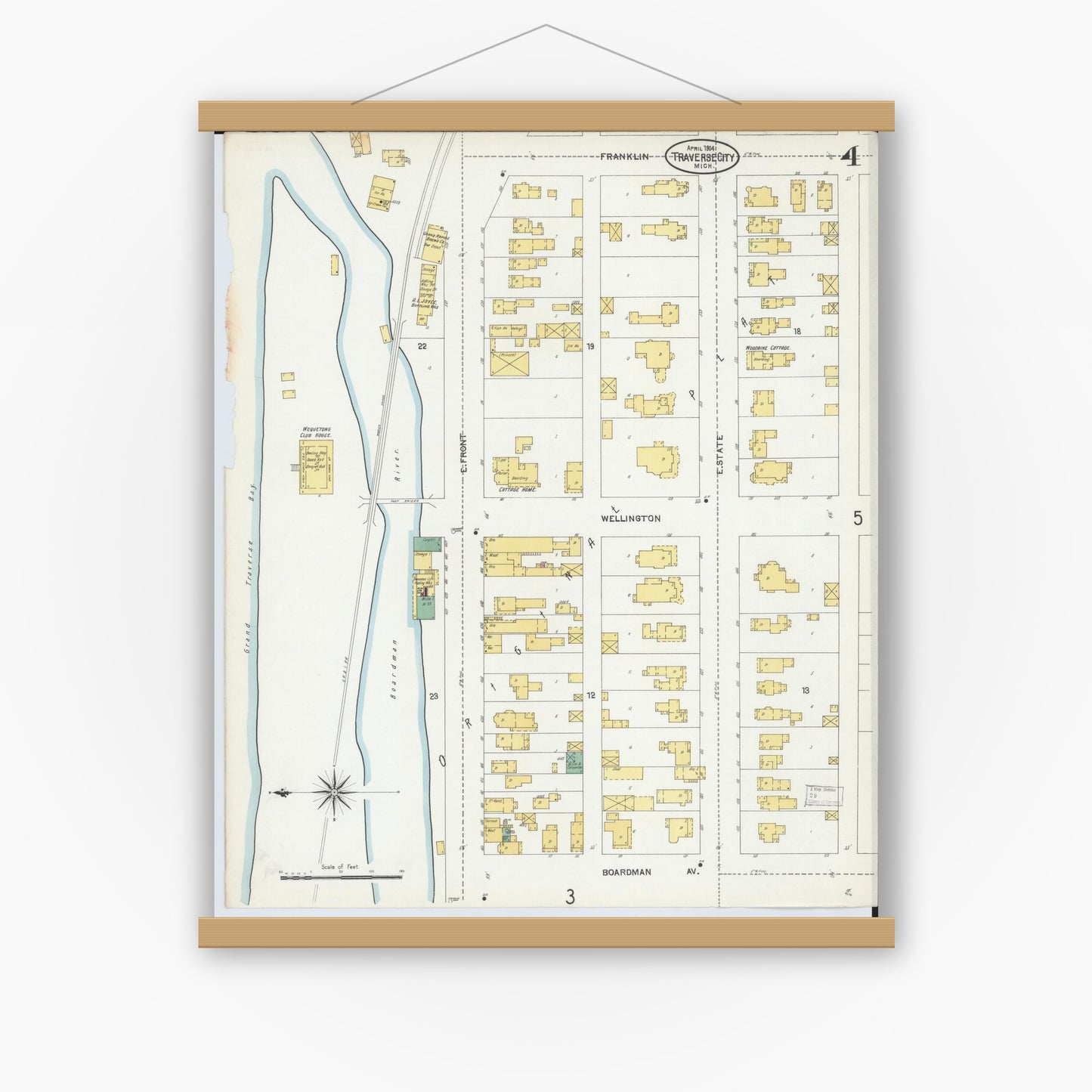 Old map wall art mockup — magnetic wood frame on white wall — Sanborn Fire Insurance Map from Traverse City, Grand Traverse County, Michigan (1904), Sheet #0004