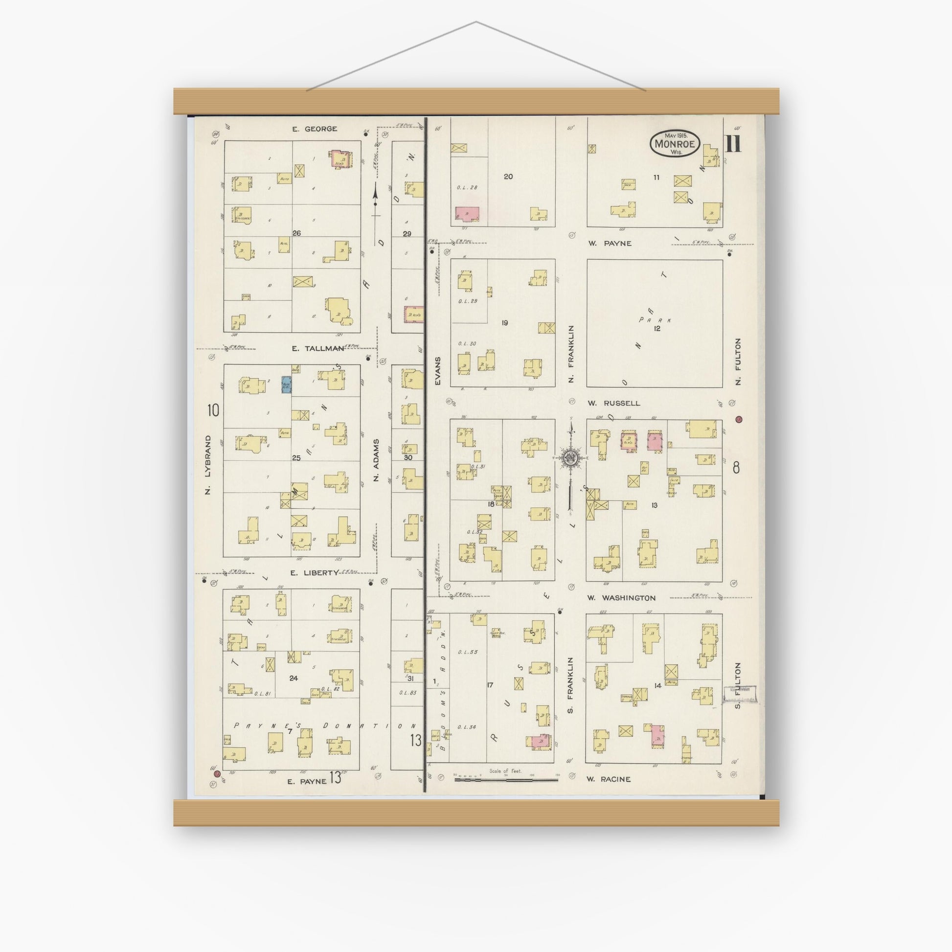 Old map wall art mockup — magnetic wood frame on white wall — Sanborn Fire Insurance Map from Monroe, Green County, Wisconsin (1915), Sheet #0011