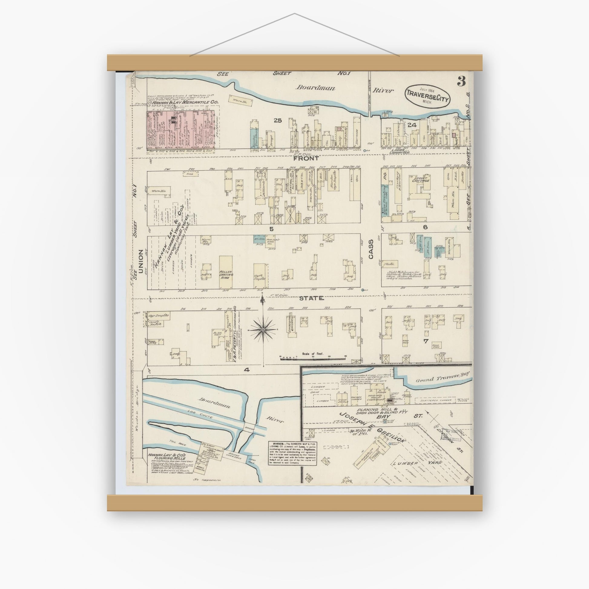 Old map wall art mockup — magnetic wood frame on white wall — Sanborn Fire Insurance Map from Traverse City, Grand Traverse County, Michigan (1884), Sheet #0003