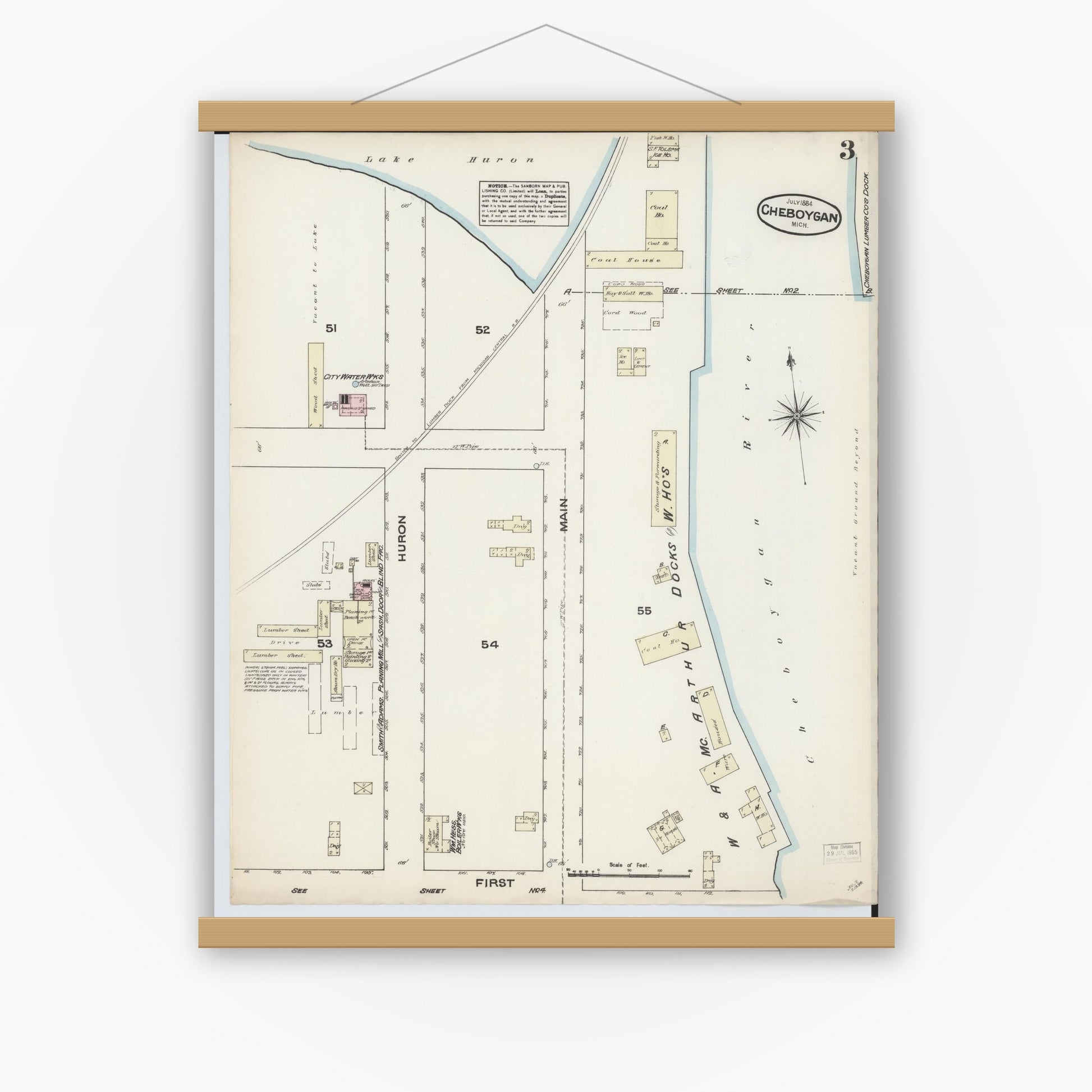 Old map wall art mockup — magnetic wood frame on white wall — Sanborn Fire Insurance Map from Cheboygan, Cheboygan County, Michigan (1884), Sheet #0003