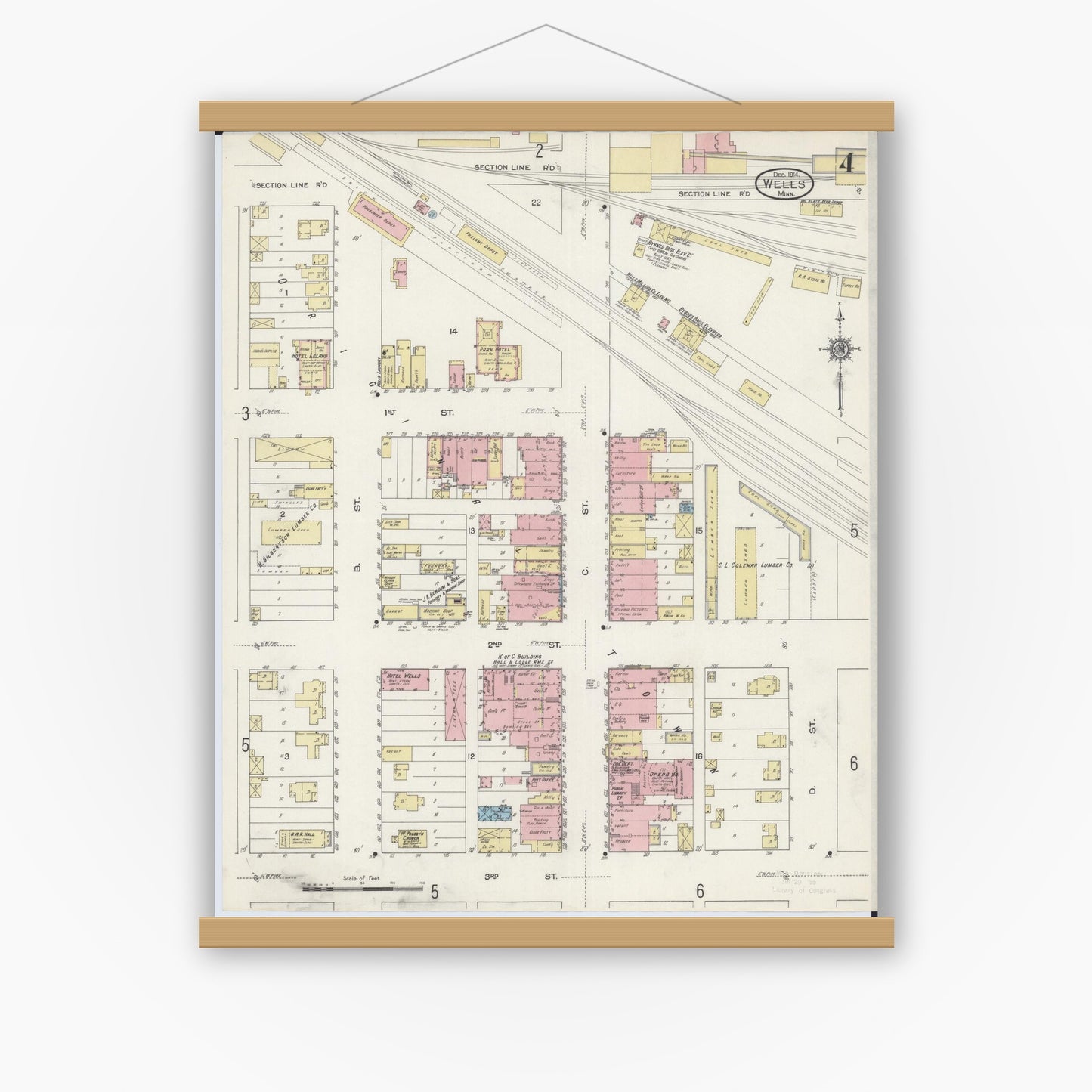 Old map wall art mockup — magnetic wood frame on white wall — Sanborn Fire Insurance Map from Wells, Faribault County, Minnesota (1914), Sheet #0004