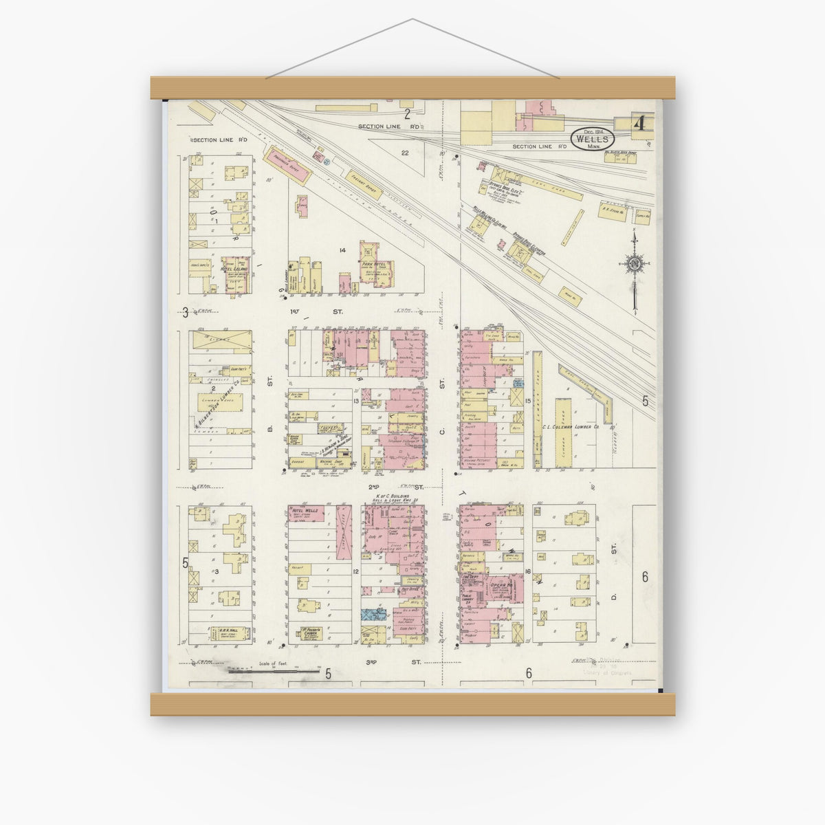 Old map wall art mockup — magnetic wood frame on white wall — Sanborn Fire Insurance Map from Wells, Faribault County, Minnesota (1914), Sheet #0004
