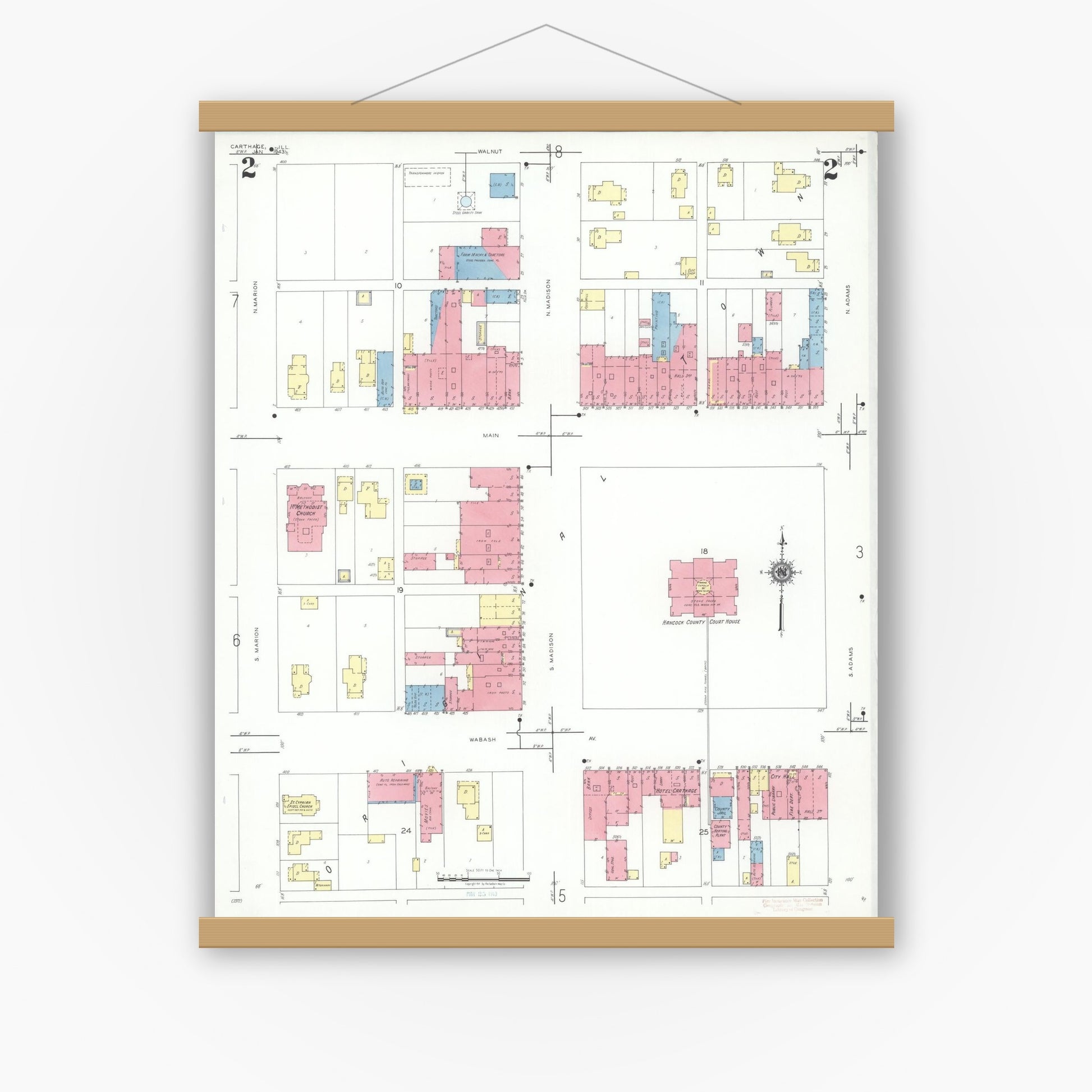Old map wall art mockup — magnetic wood frame on white wall — Sanborn Fire Insurance Map from Carthage, Hancock County, Illinois (1943), Sheet #0002
