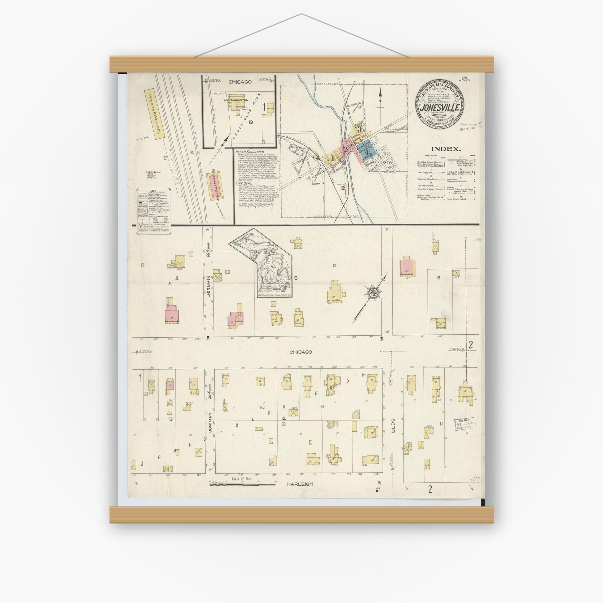 Old map wall art mockup — magnetic wood frame on white wall — Sanborn Fire Insurance Map from Jonesville, Hillsdale County, Michigan (1913) - Complete Map Set