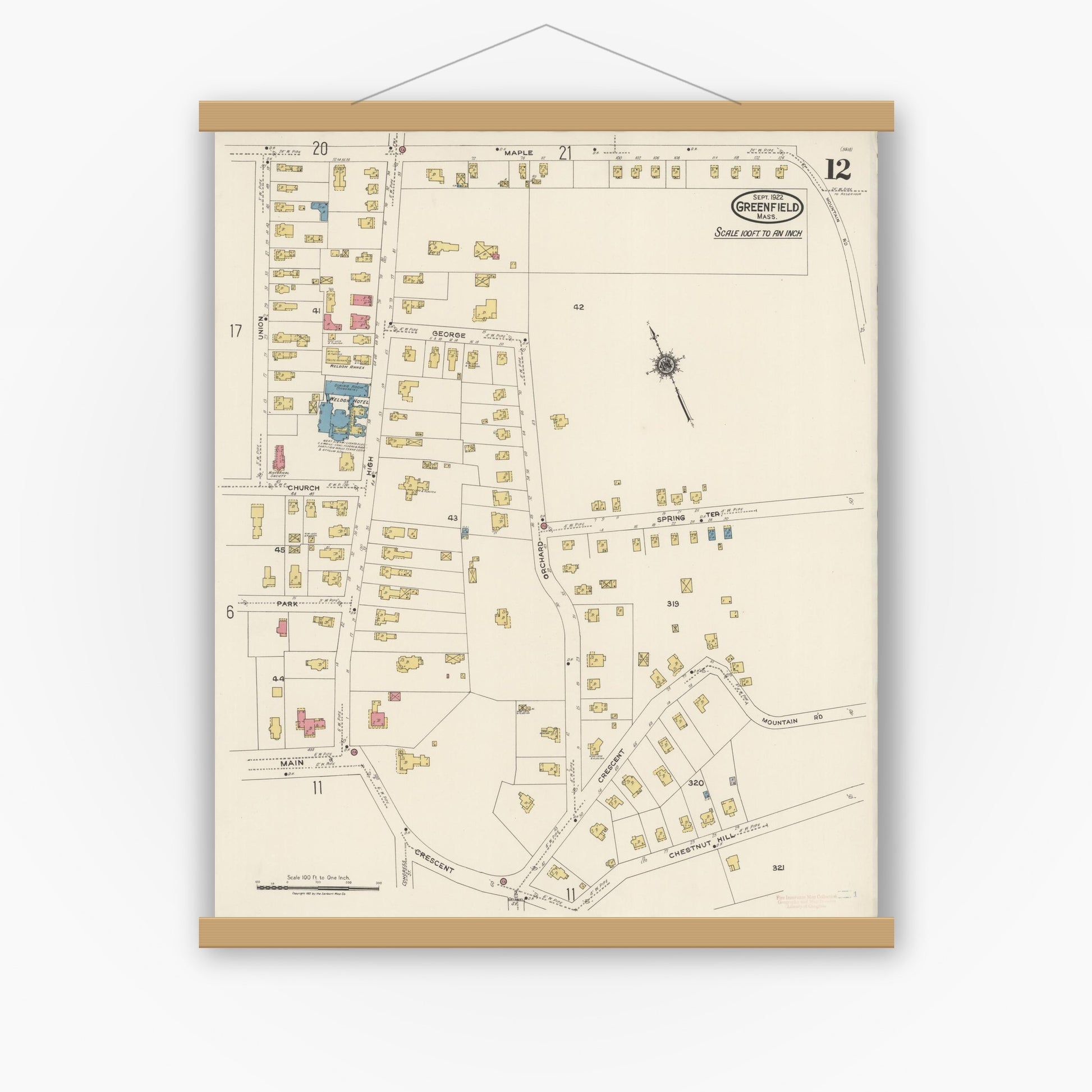 Old map wall art mockup — magnetic wood frame on white wall — Sanborn Fire Insurance Map from Greenfield, Franklin County, Massachusetts (1922), Sheet #0012