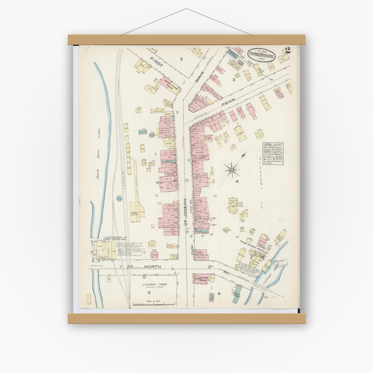 Old map wall art mockup — magnetic wood frame on white wall — Sanborn Fire Insurance Map from Three Rivers, Saint Joseph County, Michigan (1884), Sheet #0002