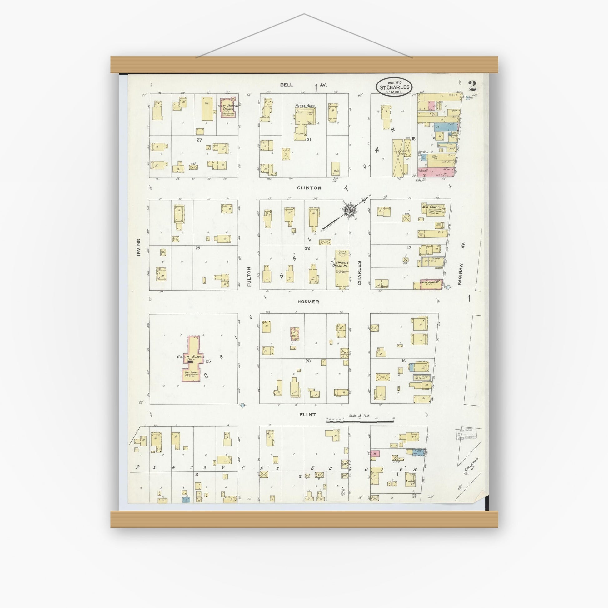 Old map wall art mockup — magnetic wood frame on white wall — Sanborn Fire Insurance Map from Saint Charles, Saginaw County, Michigan (1910), Sheet #0002