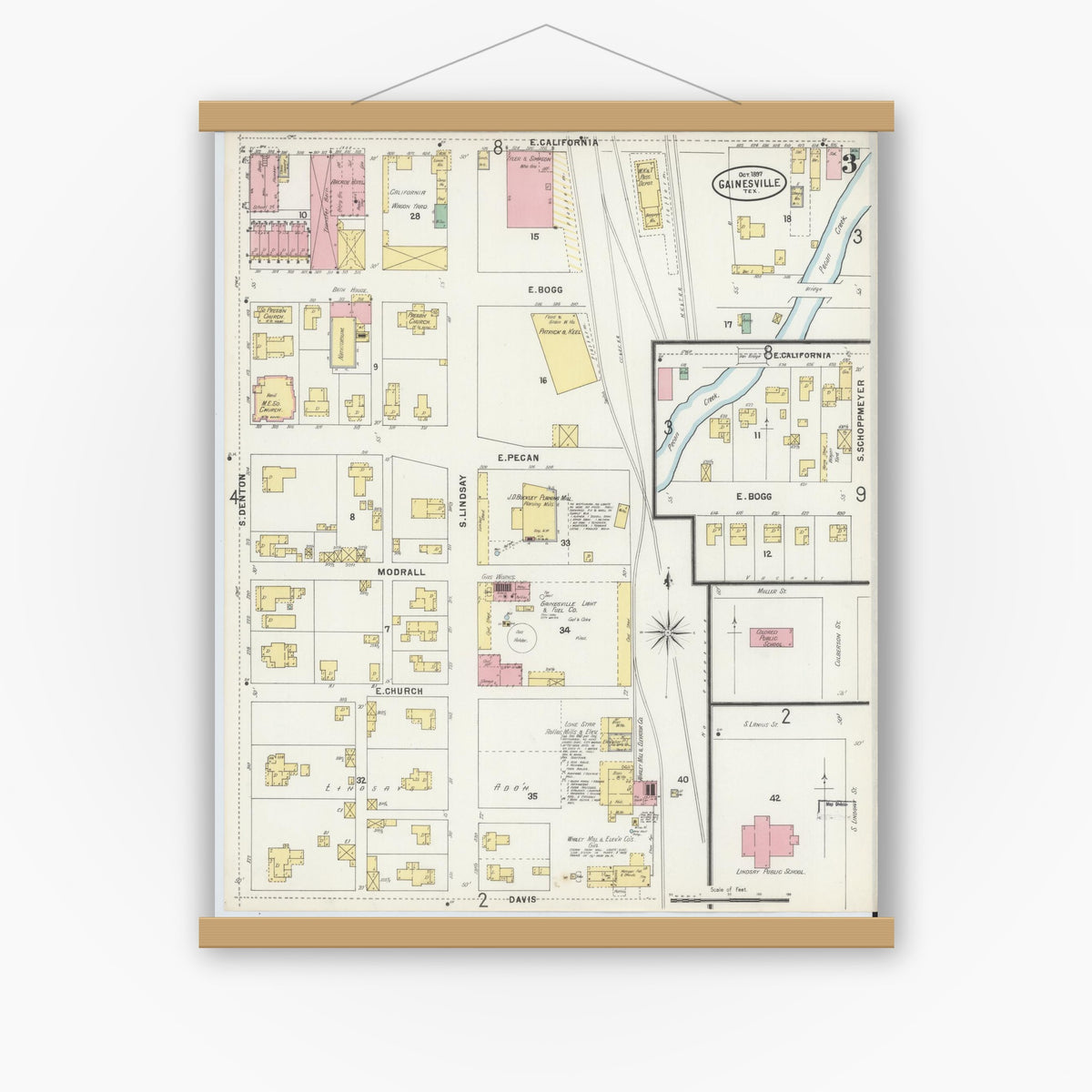 Old map wall art mockup — magnetic wood frame on white wall — Sanborn Fire Insurance Map from Gainesville, Cooke County, Texas (1897), Sheet #0003