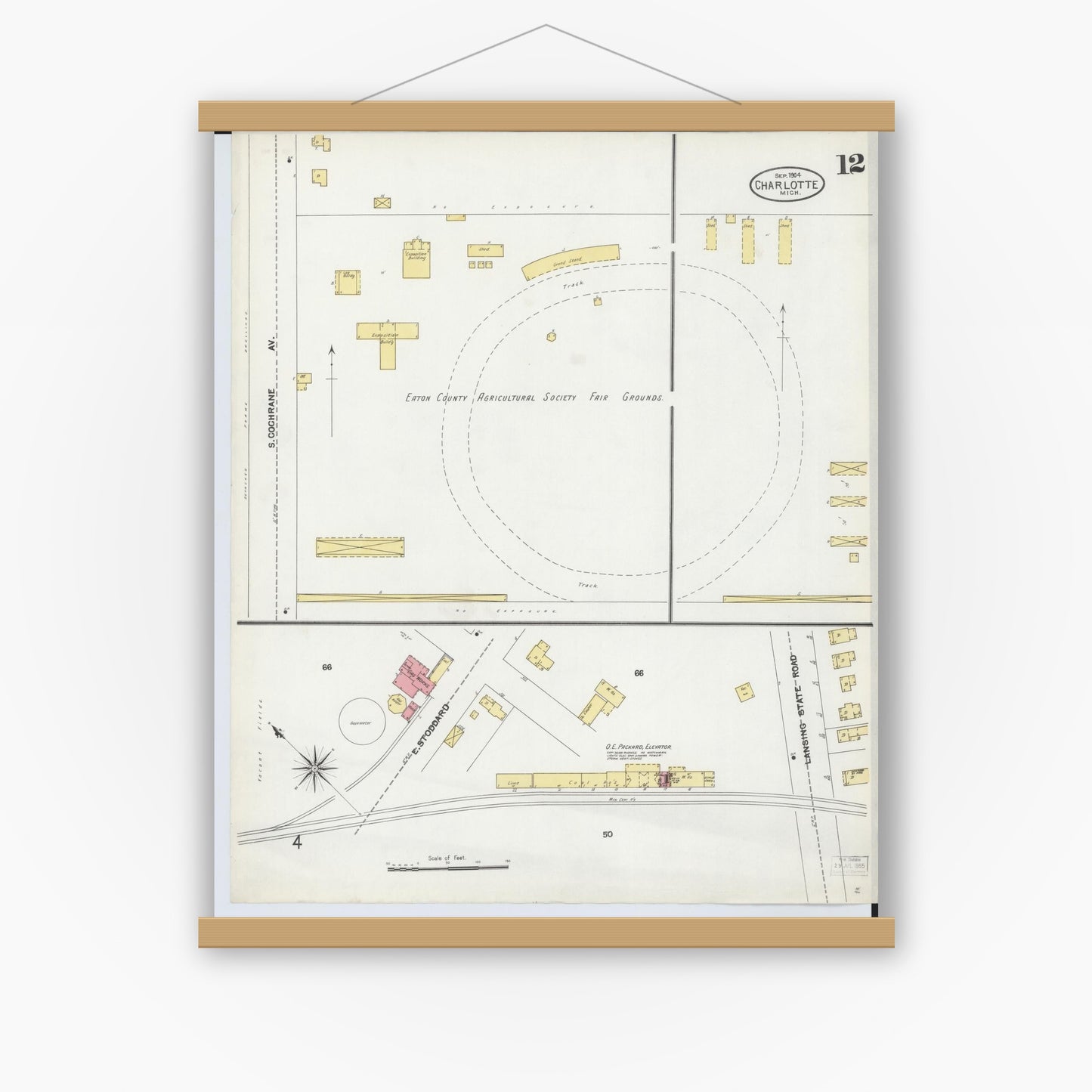 Old map wall art mockup — magnetic wood frame on white wall — Sanborn Fire Insurance Map from Charlotte, Eaton County, Michigan (1904), Sheet #0012