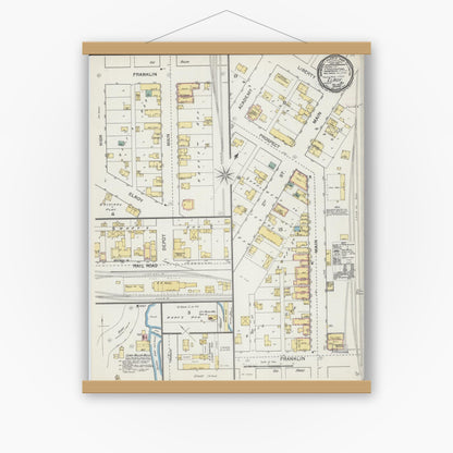 Old map wall art mockup — magnetic wood frame on white wall — Sanborn Fire Insurance Map from Elroy, Juneau County, Wisconsin (1892), Sheet #0001