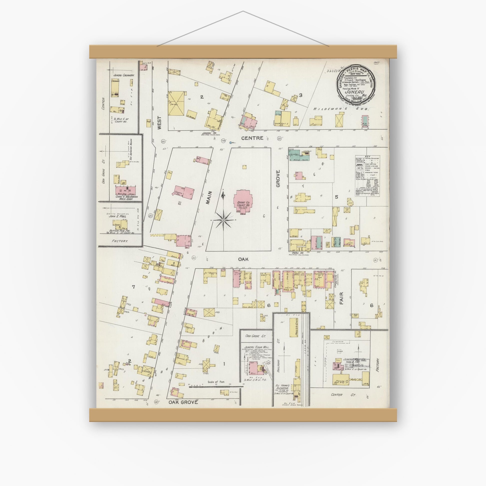 Old map wall art mockup — magnetic wood frame on white wall — Sanborn Fire Insurance Map from Juneau, Dodge County, Wisconsin (1892), Sheet #0001