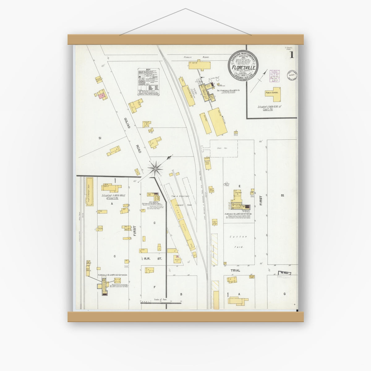 Old map wall art mockup — magnetic wood frame on white wall — Sanborn Fire Insurance Map from Floresville, Wilson County, Texas (1902), Sheet #0001