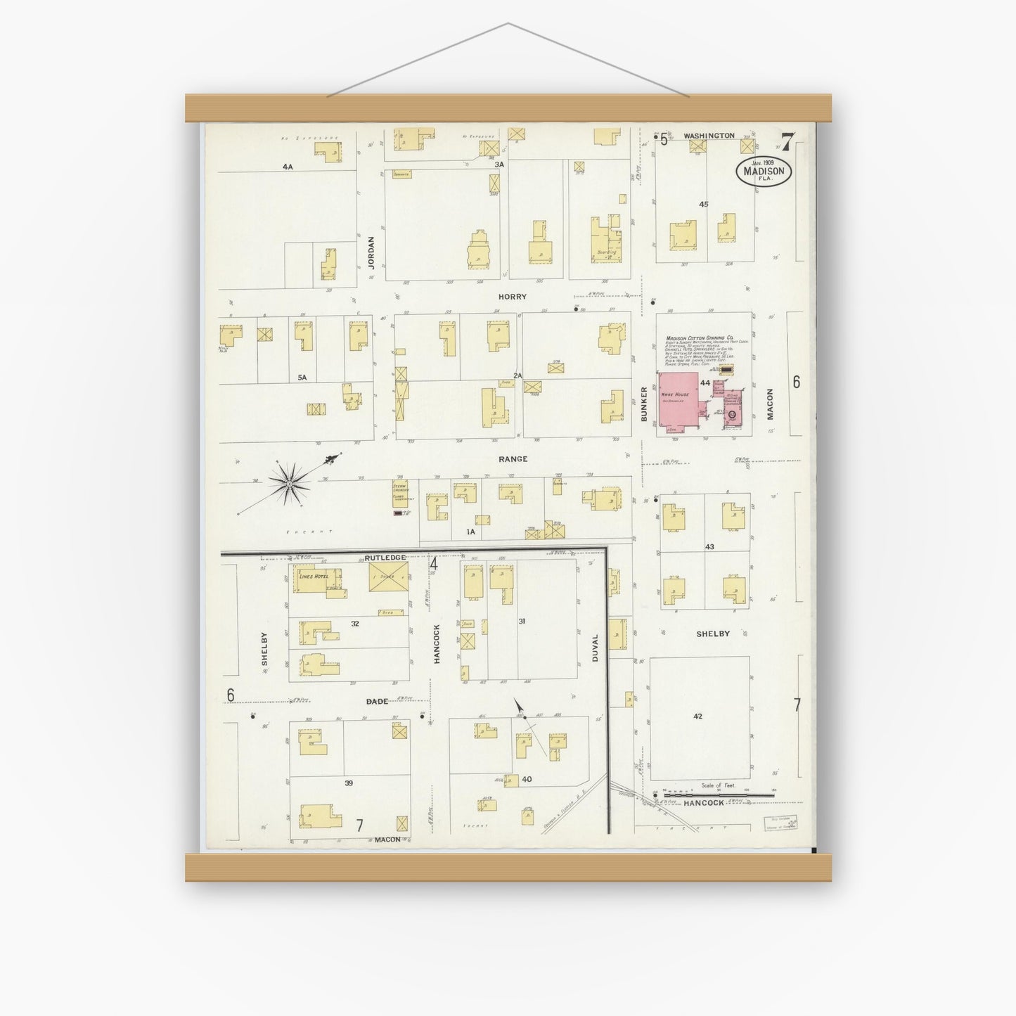 Old map wall art mockup — magnetic wood frame on white wall — Sanborn Fire Insurance Map from Madison, Madison County, Florida (1909), Sheet #0007