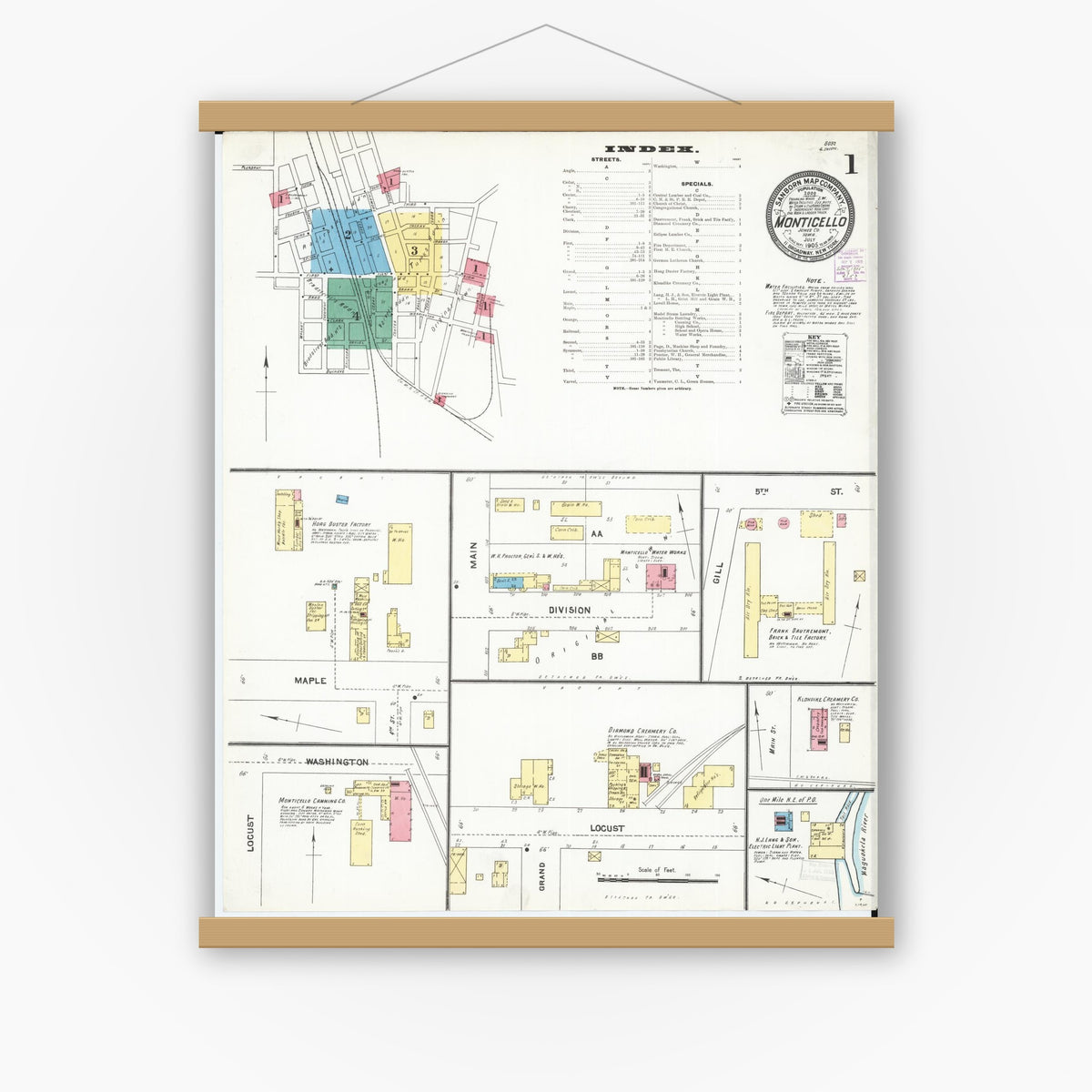 Old map wall art mockup — magnetic wood frame on white wall — Sanborn Fire Insurance Map from Monticello, Jones County, Iowa (1905) â€” Complete Set