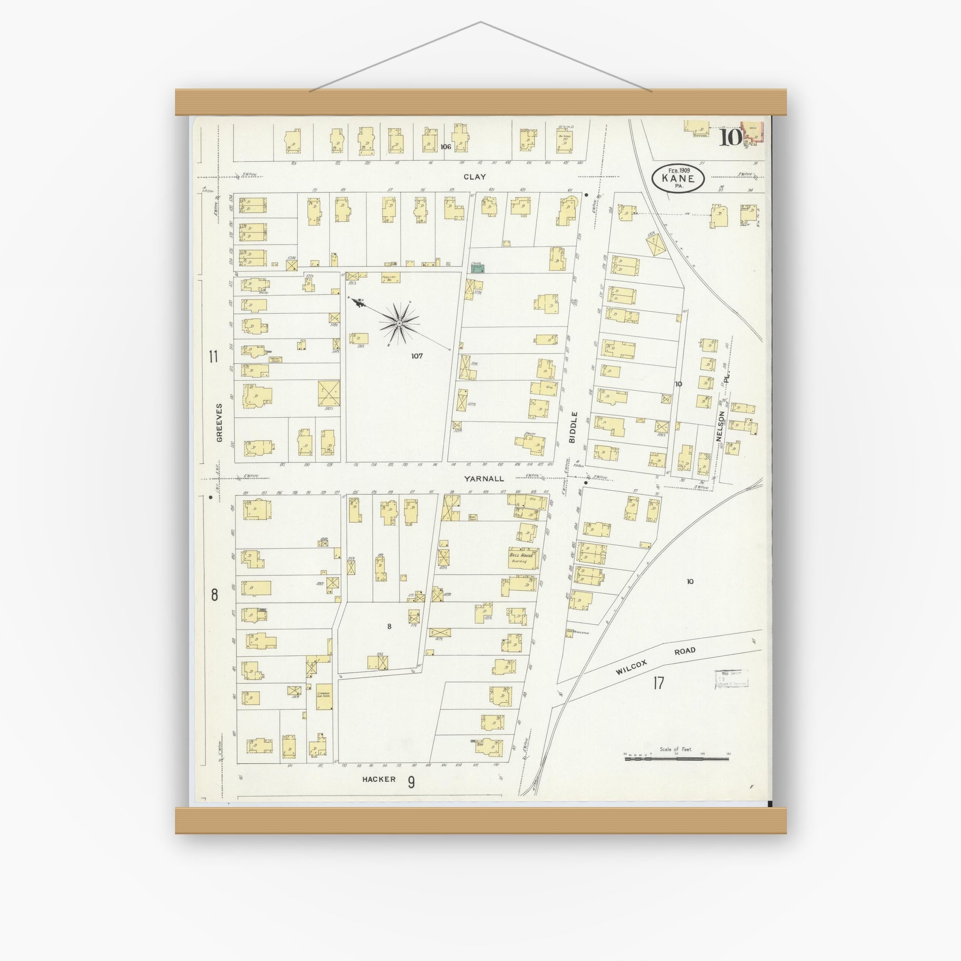 Old map wall art mockup — magnetic wood frame on white wall — Sanborn Fire Insurance Map from Kane, McKean County, Pennsylvania (1909), Sheet #0010