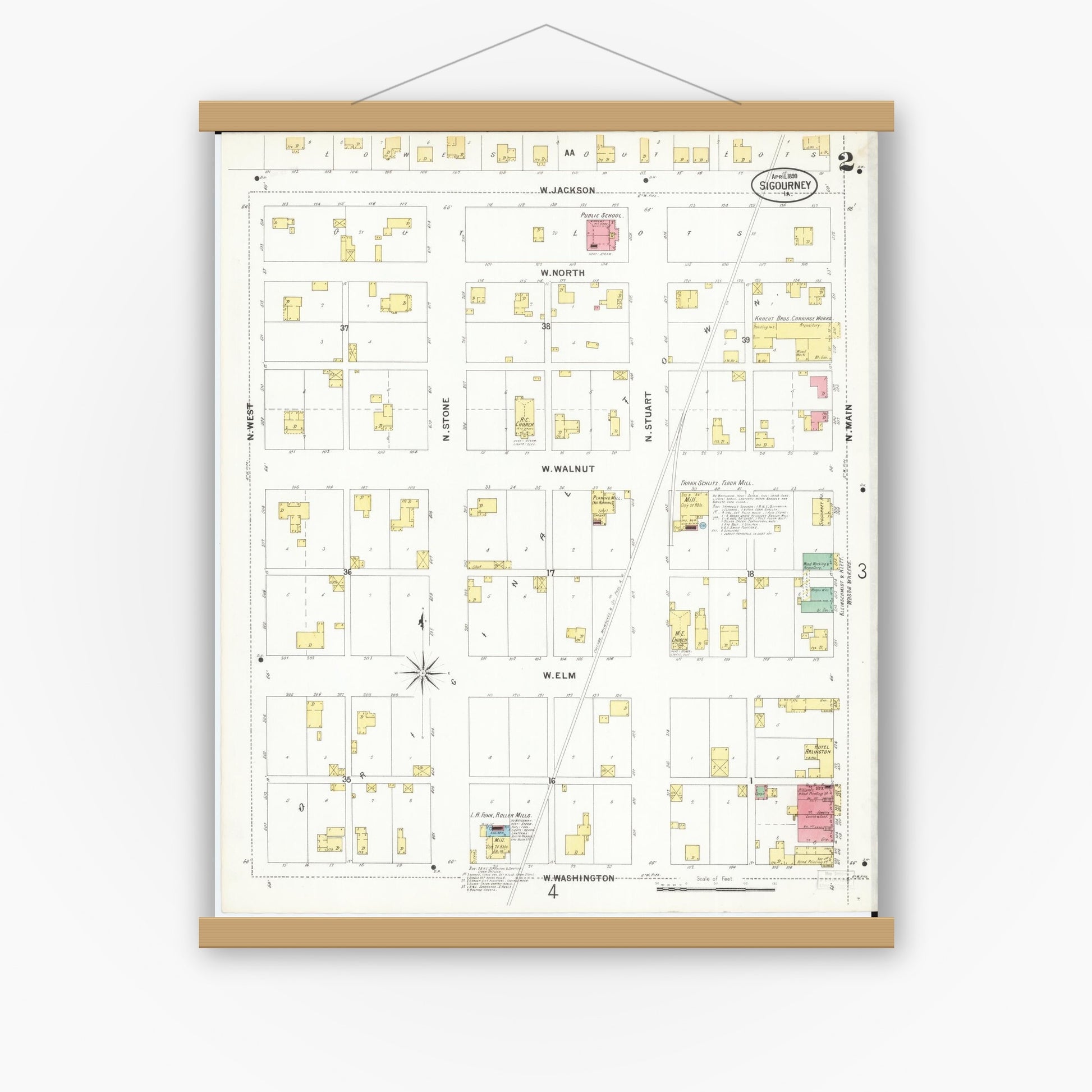 Old map wall art mockup — magnetic wood frame on white wall — Sanborn Fire Insurance Map from Sigourney, Kiokuk County, Iowa (1899), Sheet #0002