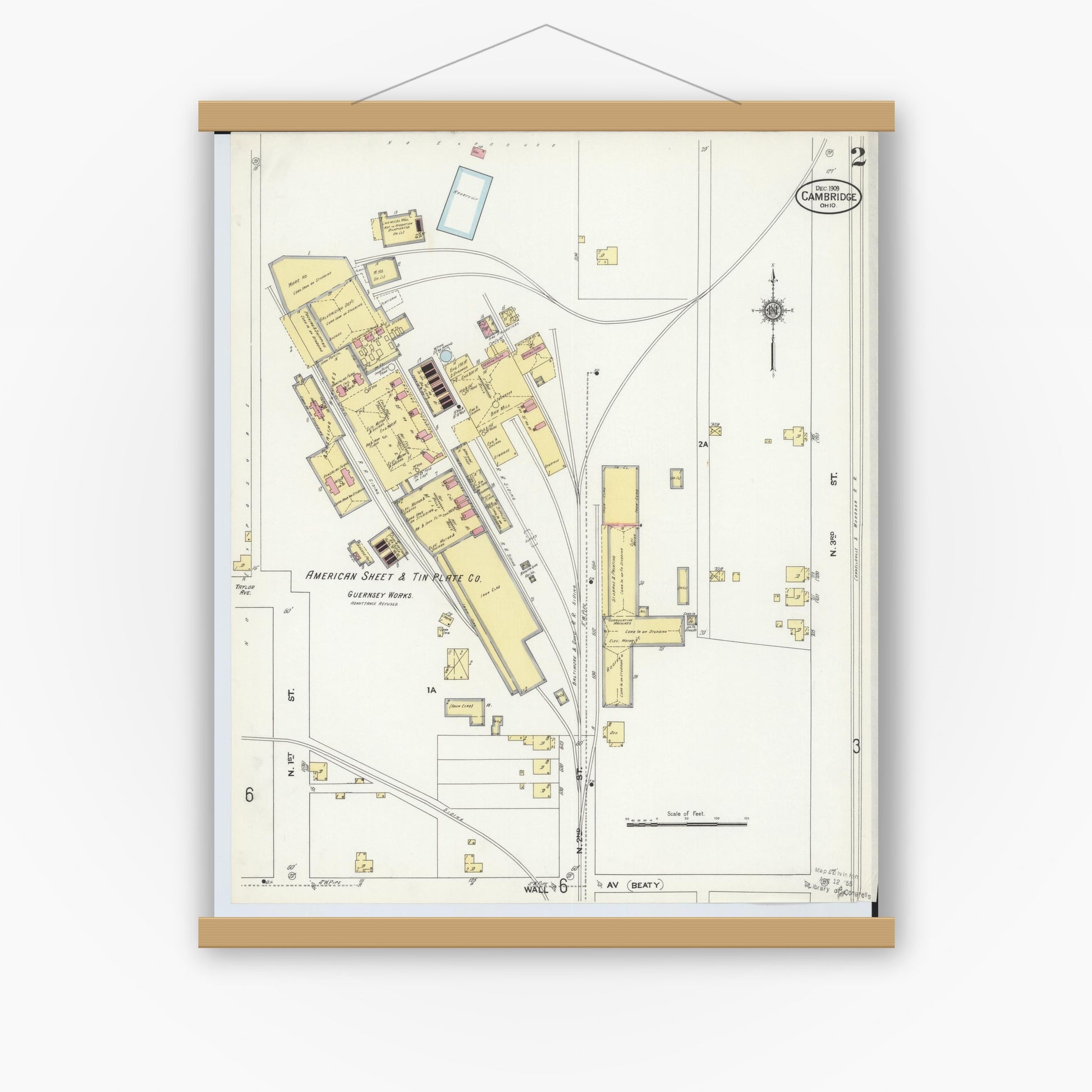 Old map wall art mockup — magnetic wood frame on white wall — Sanborn Fire Insurance Map from Cambridge, Guernsey County, Ohio (1909), Sheet #0002