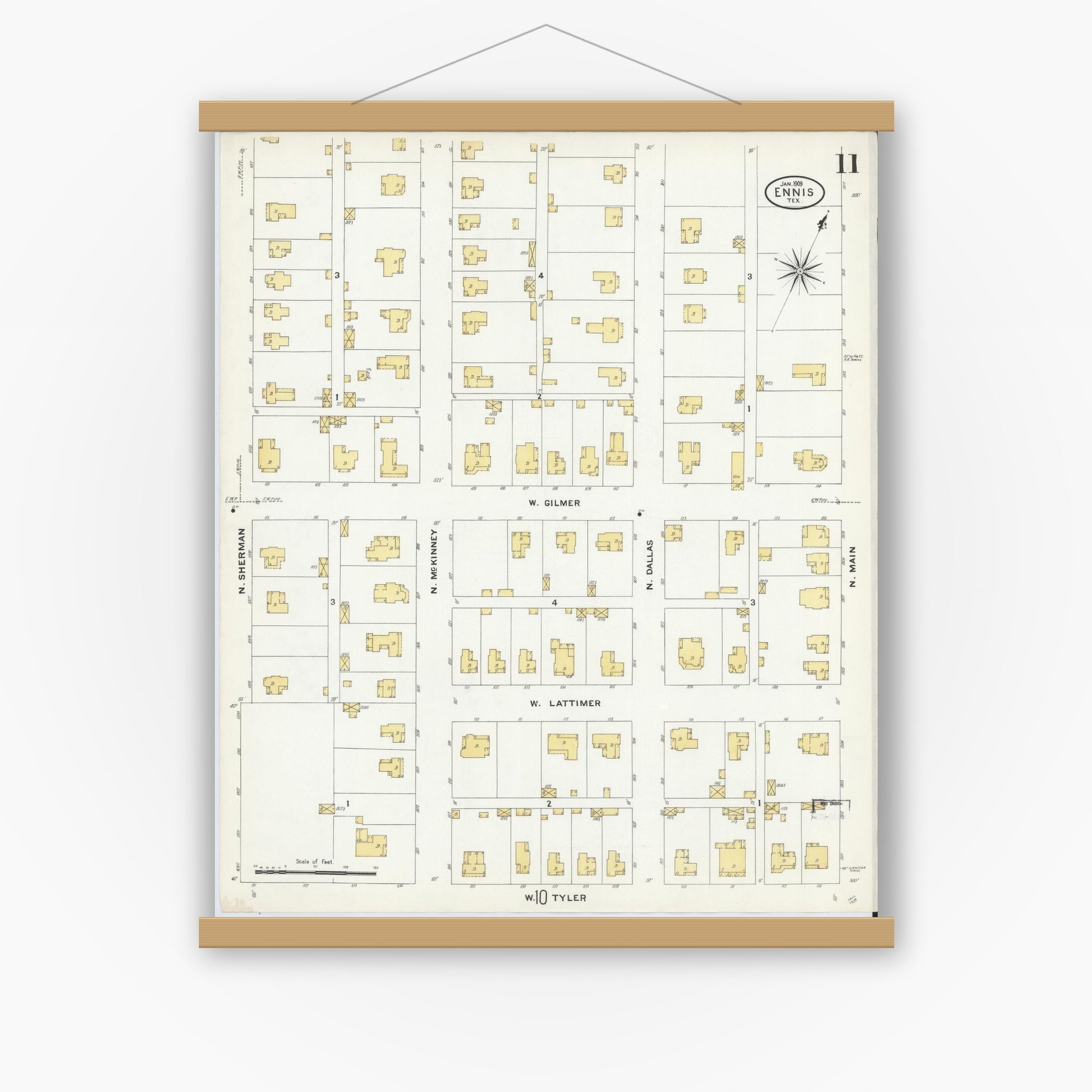 Old map wall art mockup — magnetic wood frame on white wall — Sanborn Fire Insurance Map from Ennis, Ellis County, Texas (1909), Sheet #0011