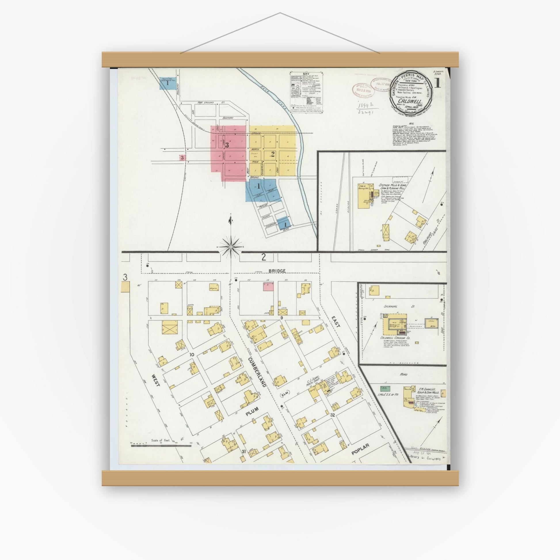 Old map wall art mockup — magnetic wood frame on white wall — Sanborn Fire Insurance Map from Caldwell, Noble County, Ohio (1899), Sheet #0001