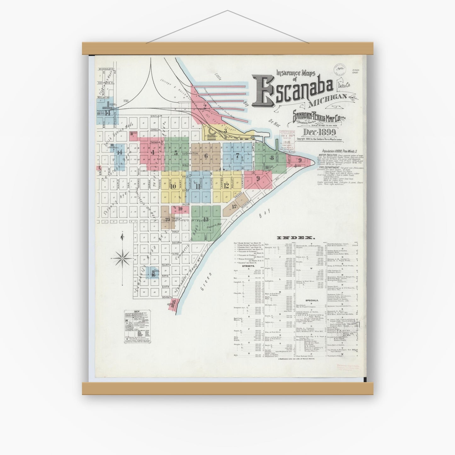 Old map wall art mockup — magnetic wood frame on white wall — Sanborn Fire Insurance Map from Escanaba, Delta County, Michigan (1899) - Complete Map Set