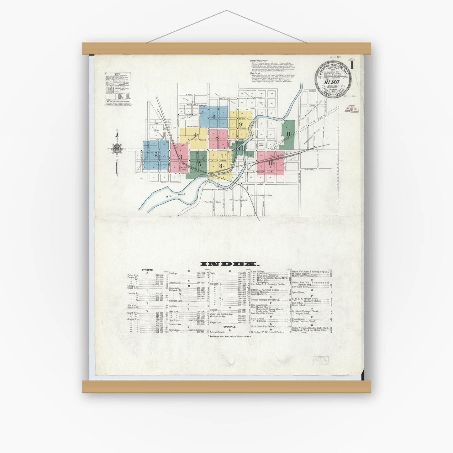 Old map wall art mockup — magnetic wood frame on white wall — Sanborn Fire Insurance Map from Alma, Gratiot County, Michigan (1910), Sheet #0001