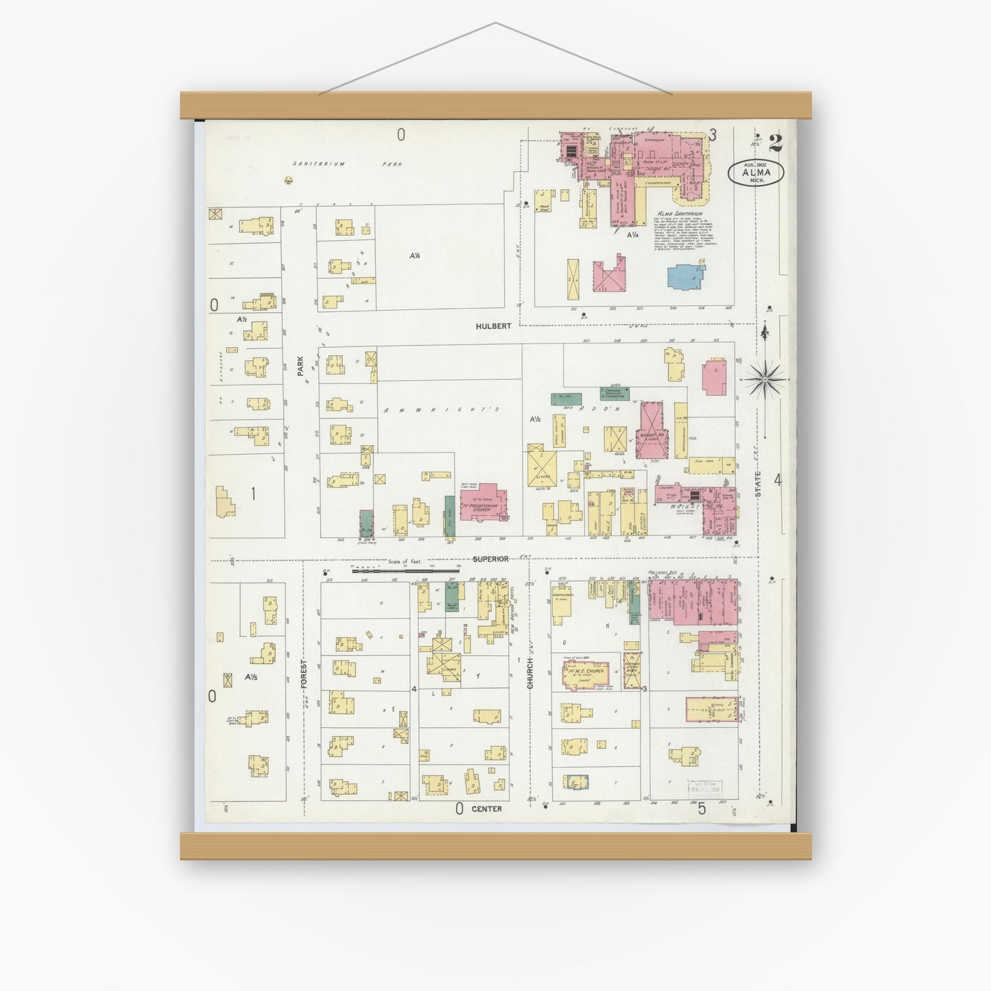 Old map wall art mockup — magnetic wood frame on white wall — Sanborn Fire Insurance Map from Alma, Gratiot County, Michigan (1902), Sheet #0002