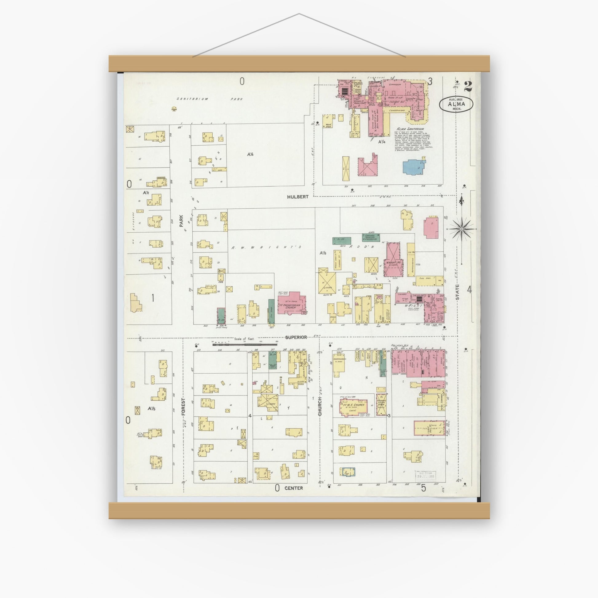 Old map wall art mockup — magnetic wood frame on white wall — Sanborn Fire Insurance Map from Alma, Gratiot County, Michigan (1902), Sheet #0002