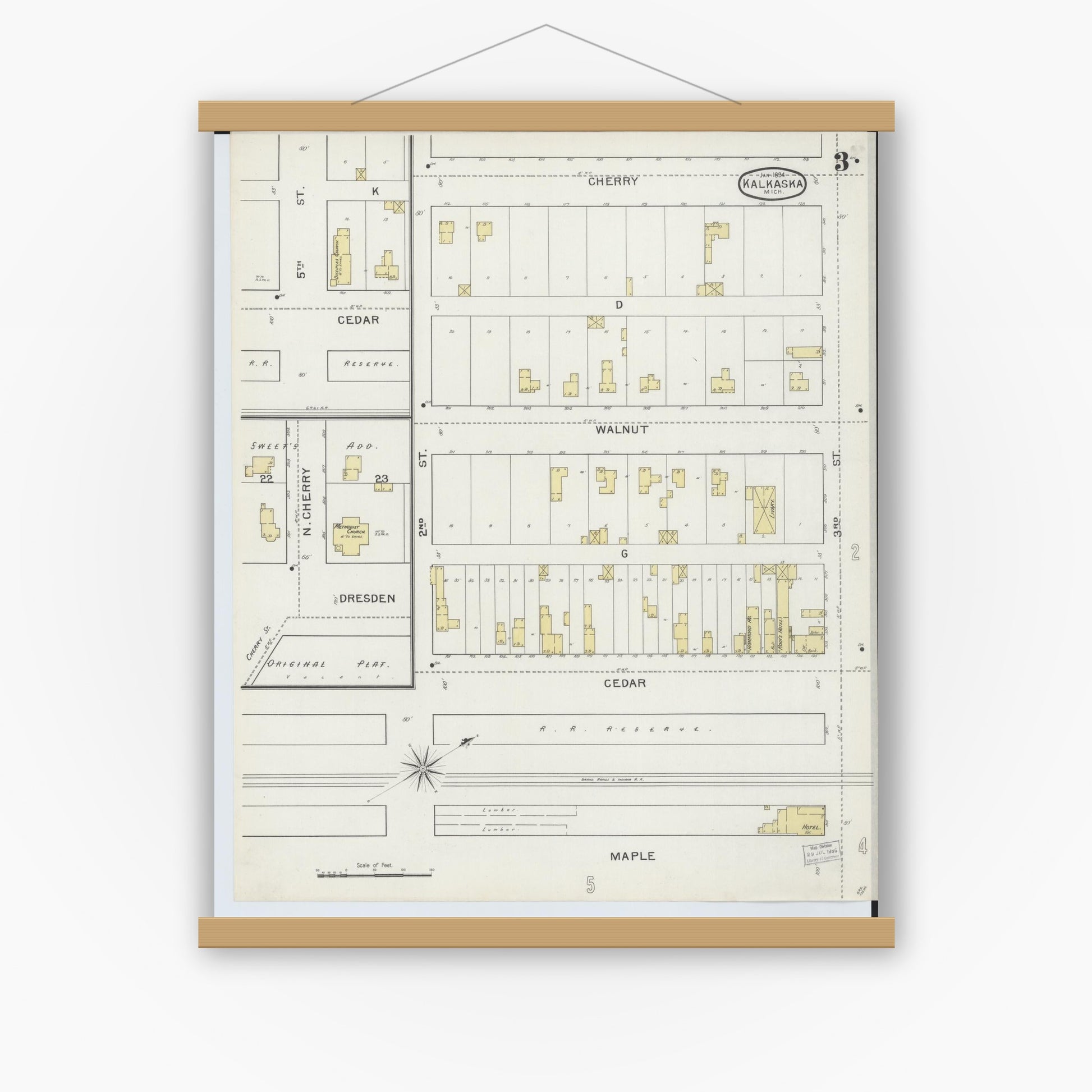 Old map wall art mockup — magnetic wood frame on white wall — Sanborn Fire Insurance Map from Kalkaska, Kalkaska County, Michigan (1894), Sheet #0003