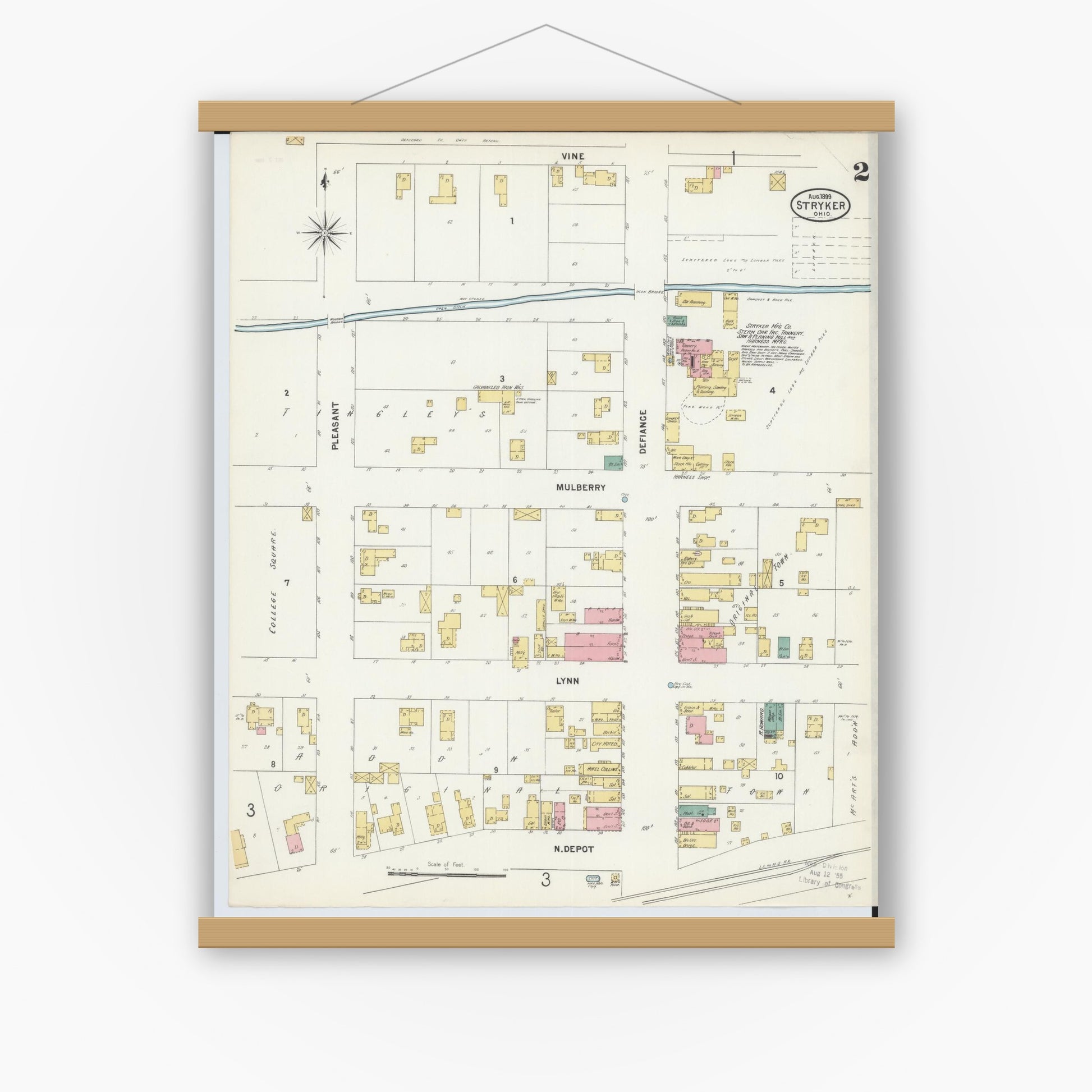Old map wall art mockup — magnetic wood frame on white wall — Sanborn Fire Insurance Map from Stryker, Williams County, Ohio (1899), Sheet #0002