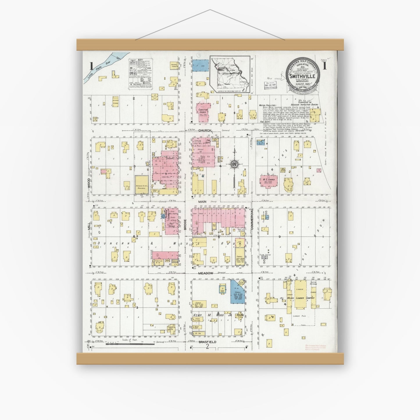 Old map wall art mockup — magnetic wood frame on white wall — Sanborn Fire Insurance Map from Smithville, Clay County, Missouri (1928) - Complete Map Set